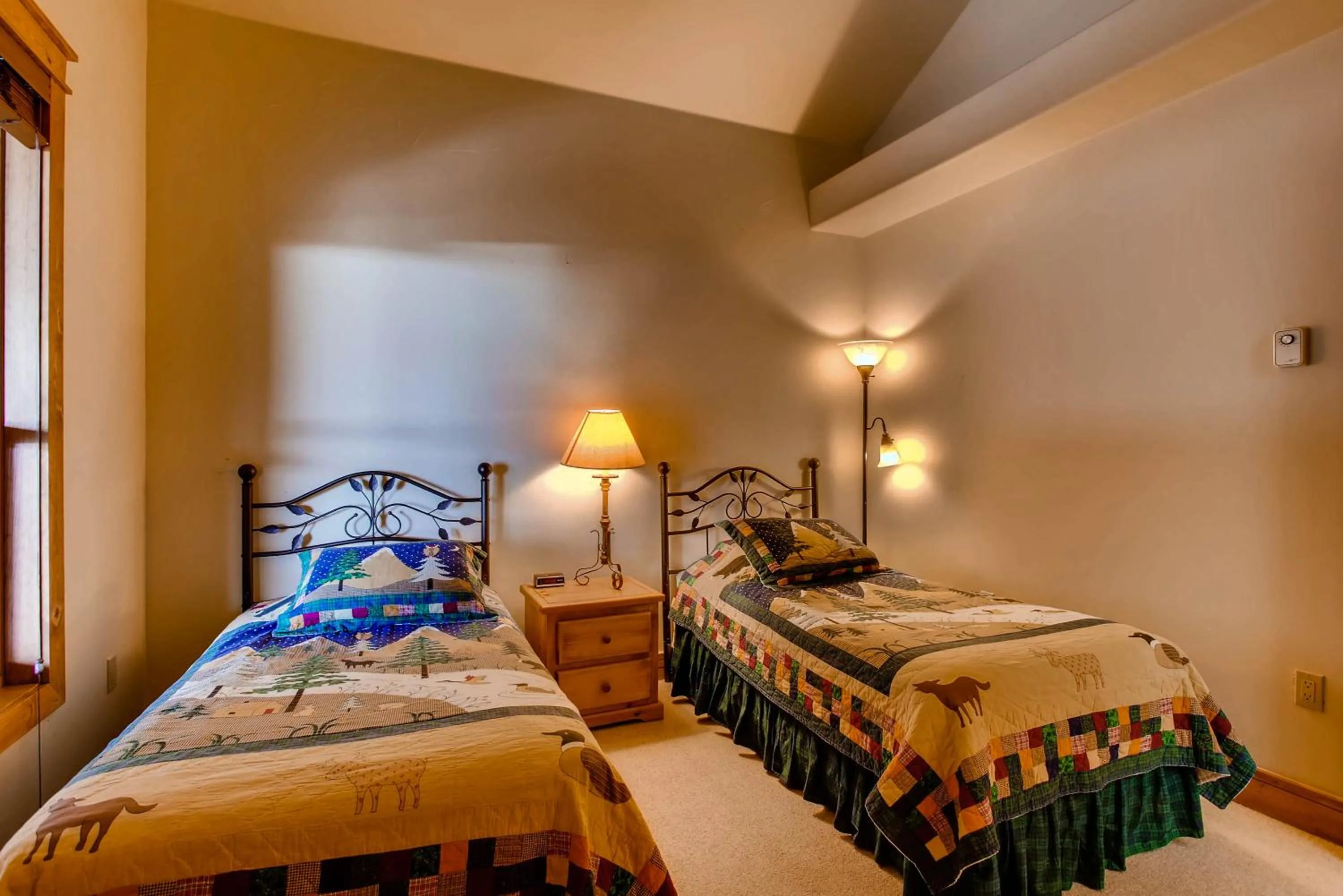 Bed in The Plaza Condominiums by Crested Butte Mountain Resort