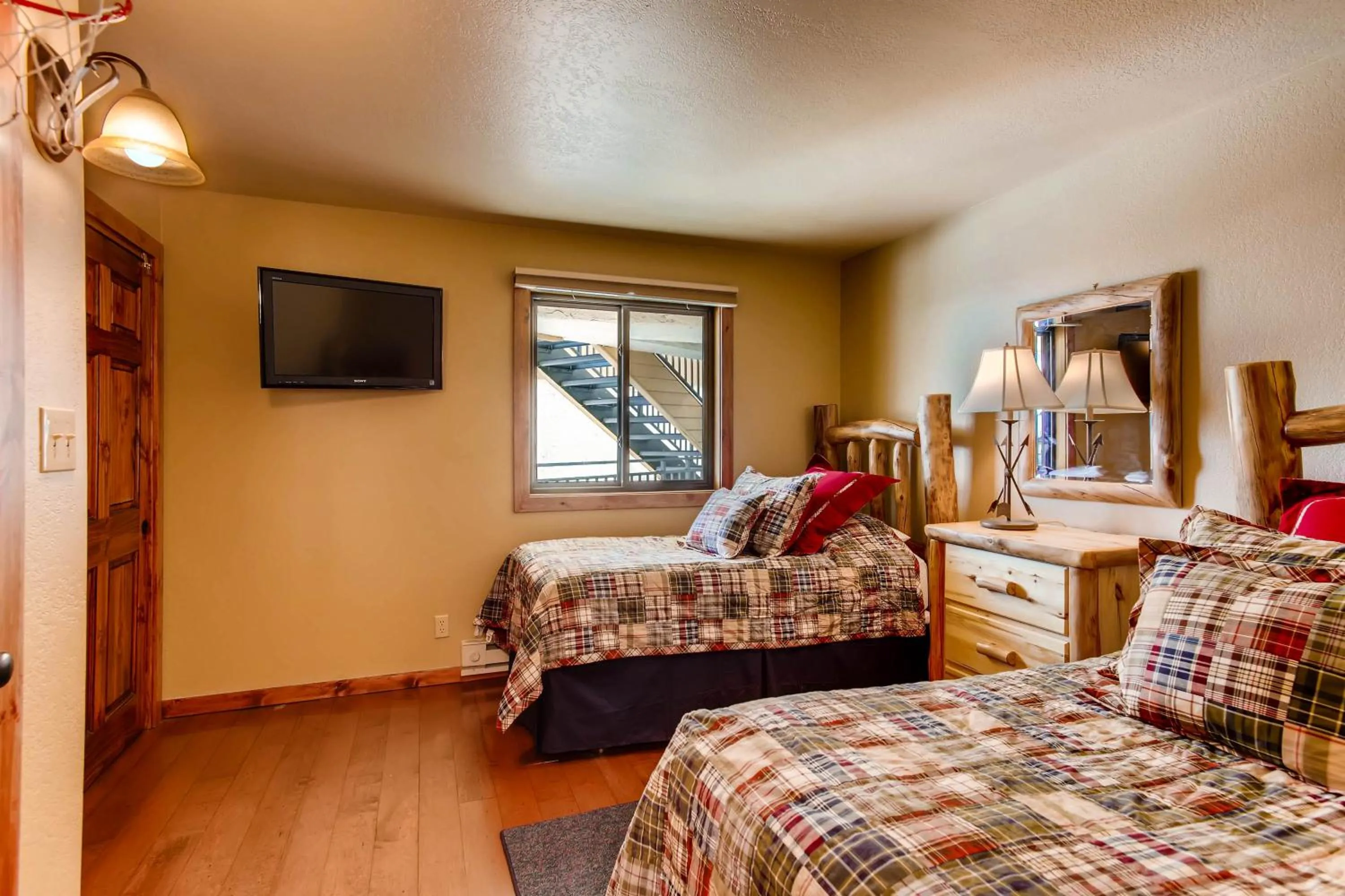 Bed in The Plaza Condominiums by Crested Butte Mountain Resort