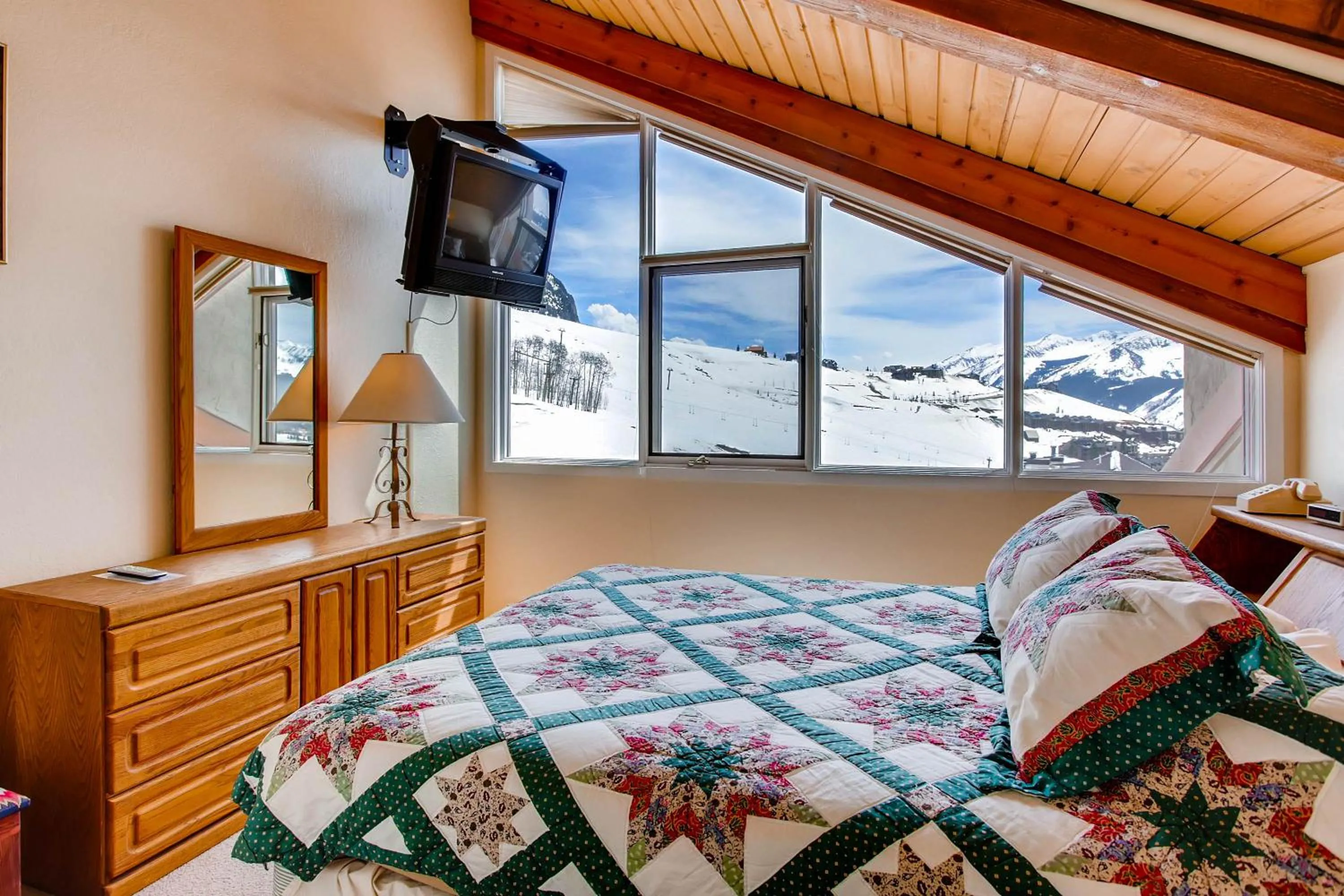 Bed in The Plaza Condominiums by Crested Butte Mountain Resort