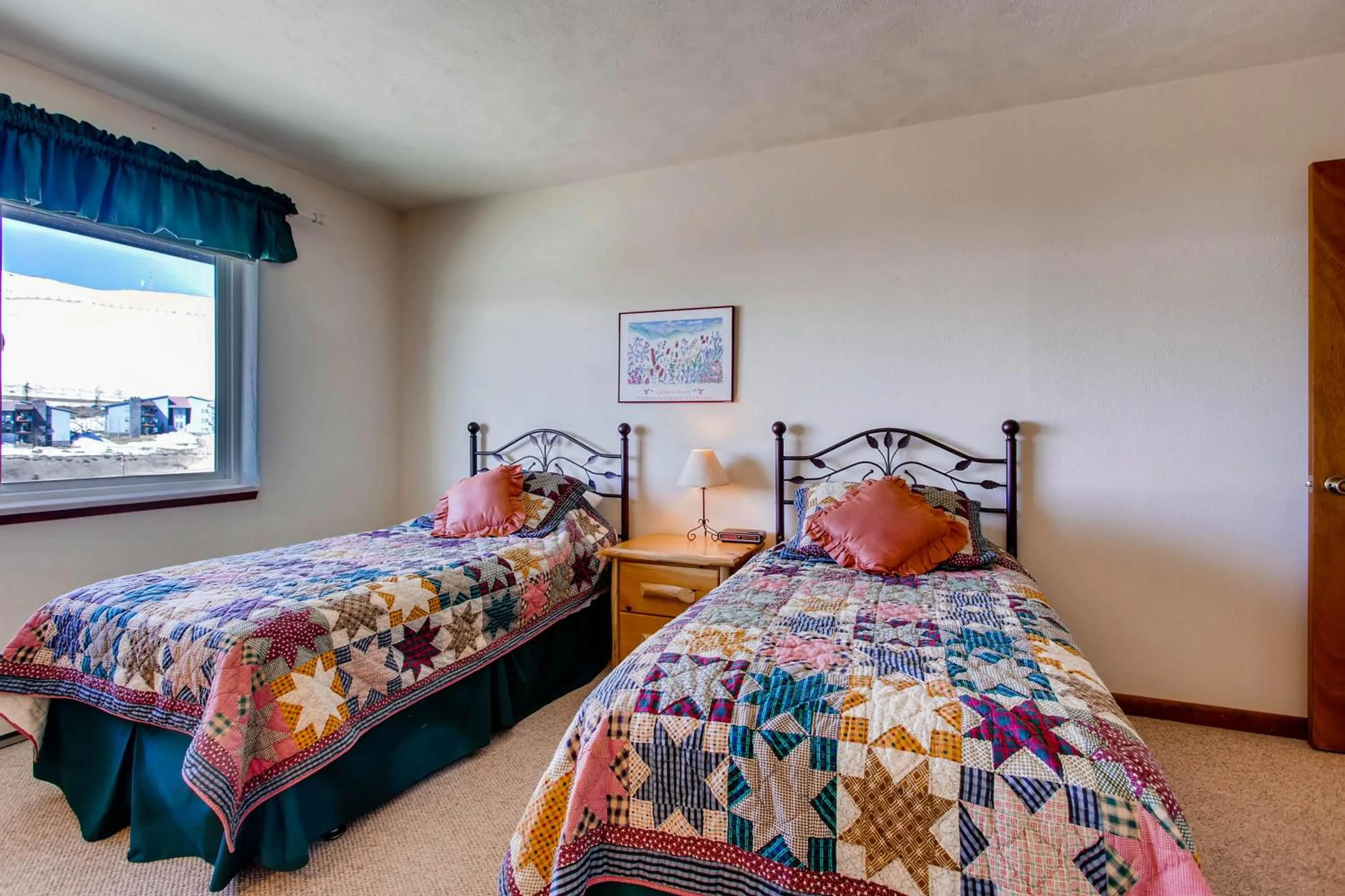 Bed in The Plaza Condominiums by Crested Butte Mountain Resort