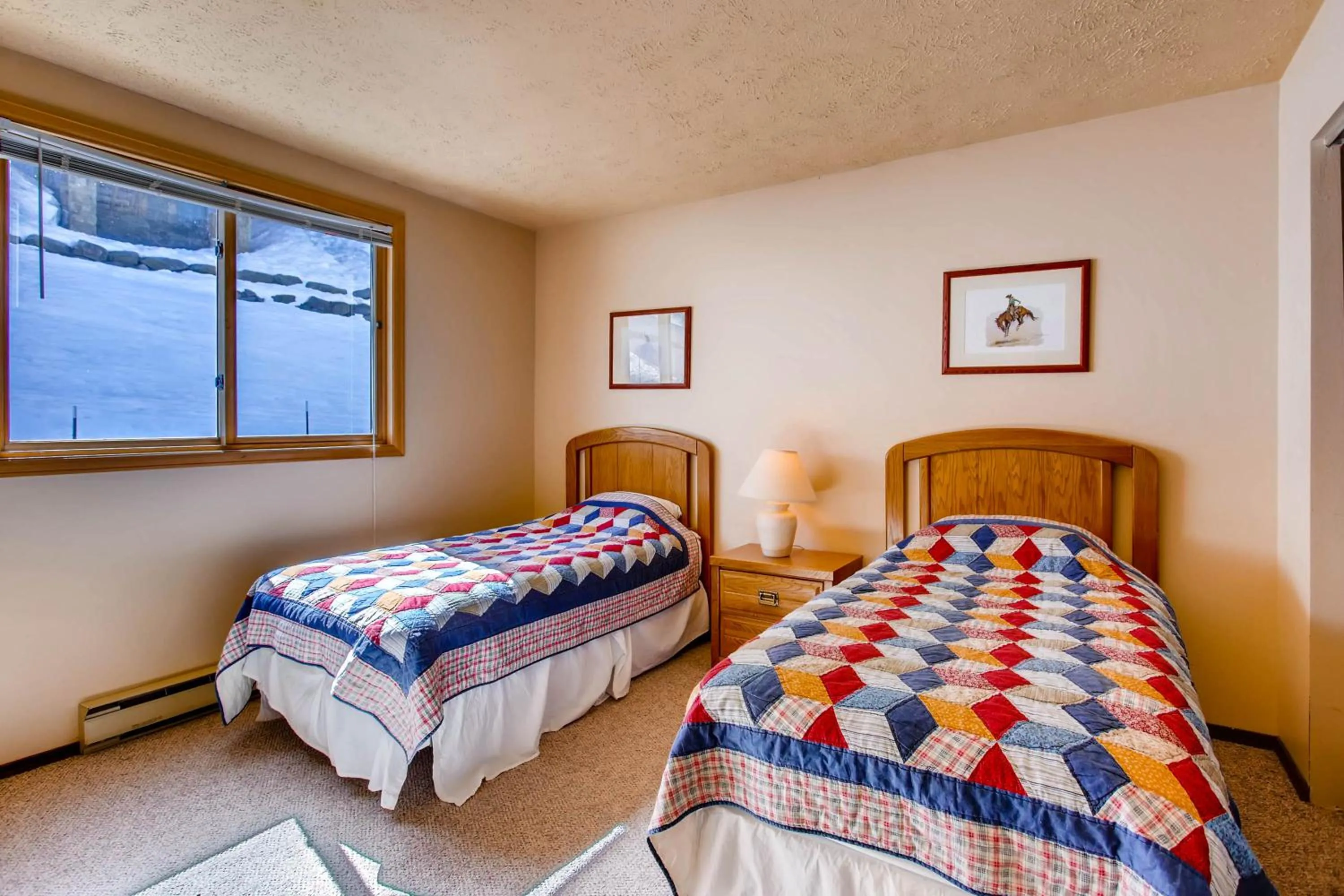 Bed in The Plaza Condominiums by Crested Butte Mountain Resort