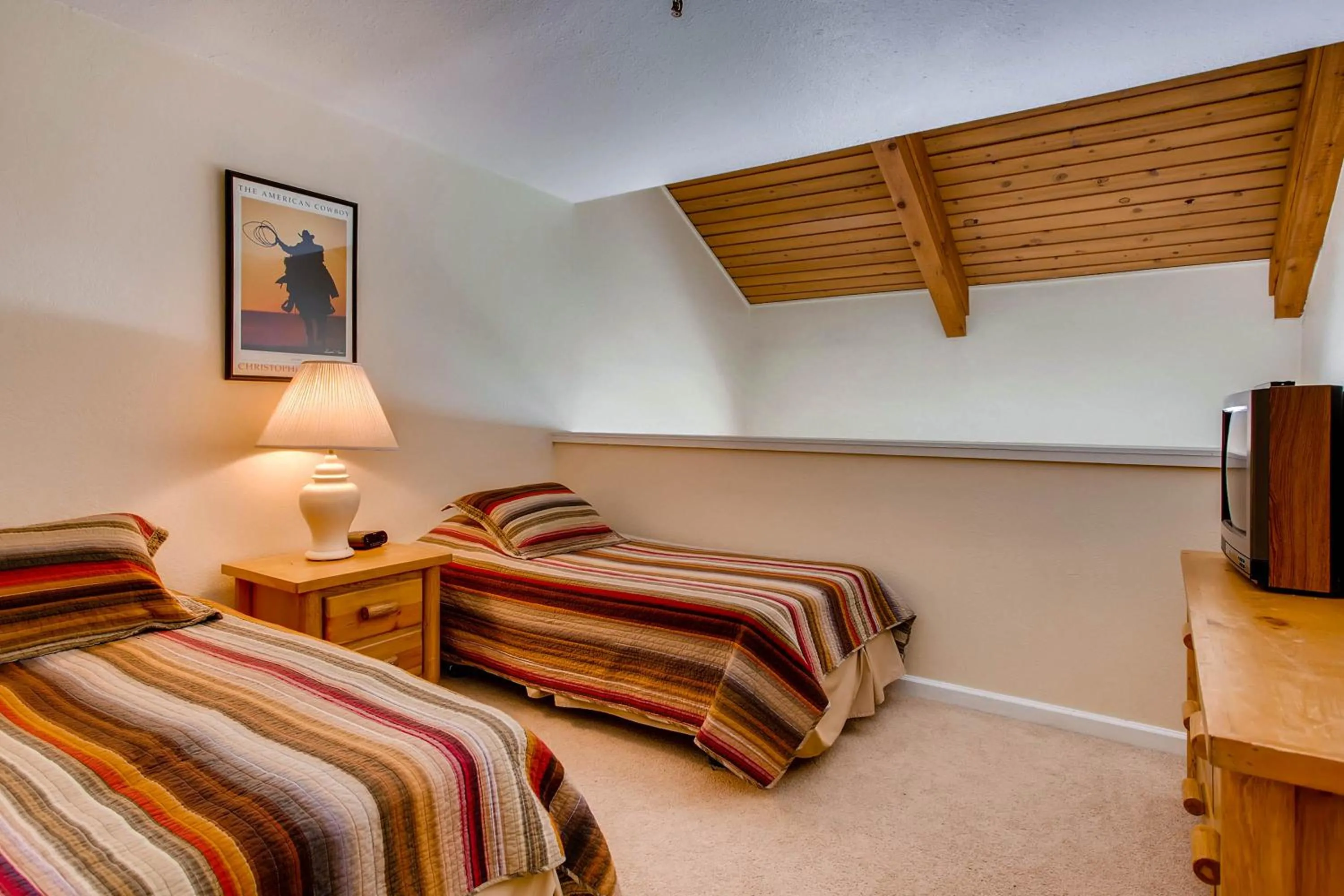 Bed in The Plaza Condominiums by Crested Butte Mountain Resort