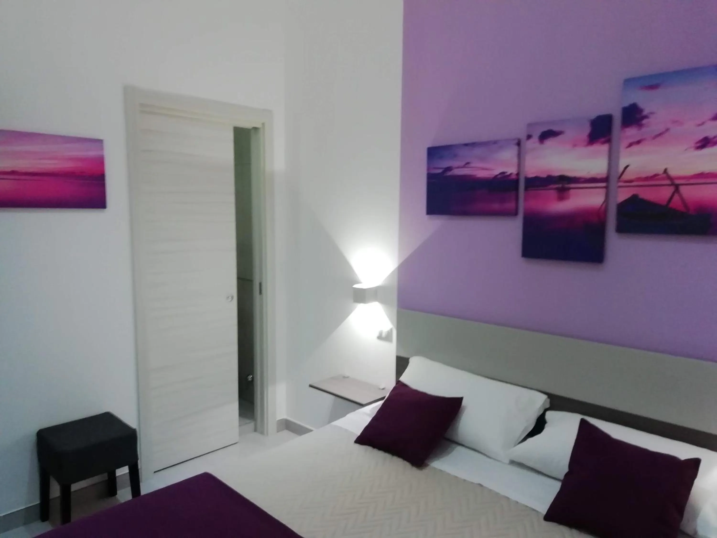 Bed in Flamingo Rooms