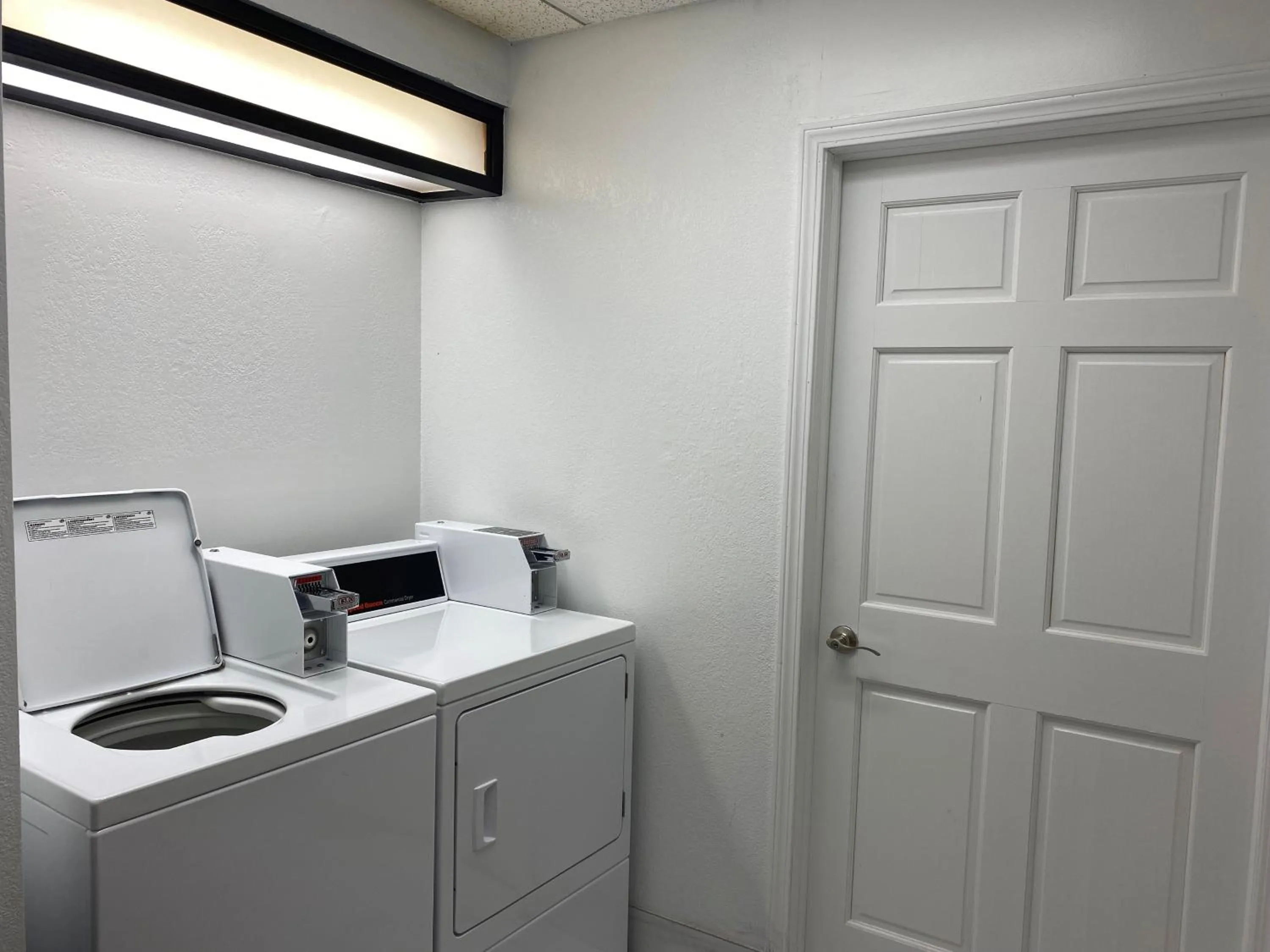 laundry in Days Inn & Suites by Wyndham Arlington Heights