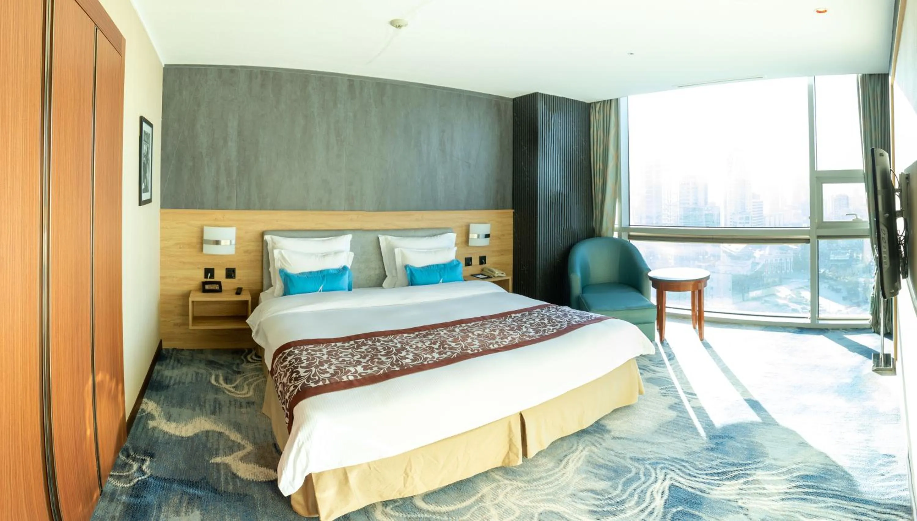 Bed in The Blue Sky Hotel and Tower