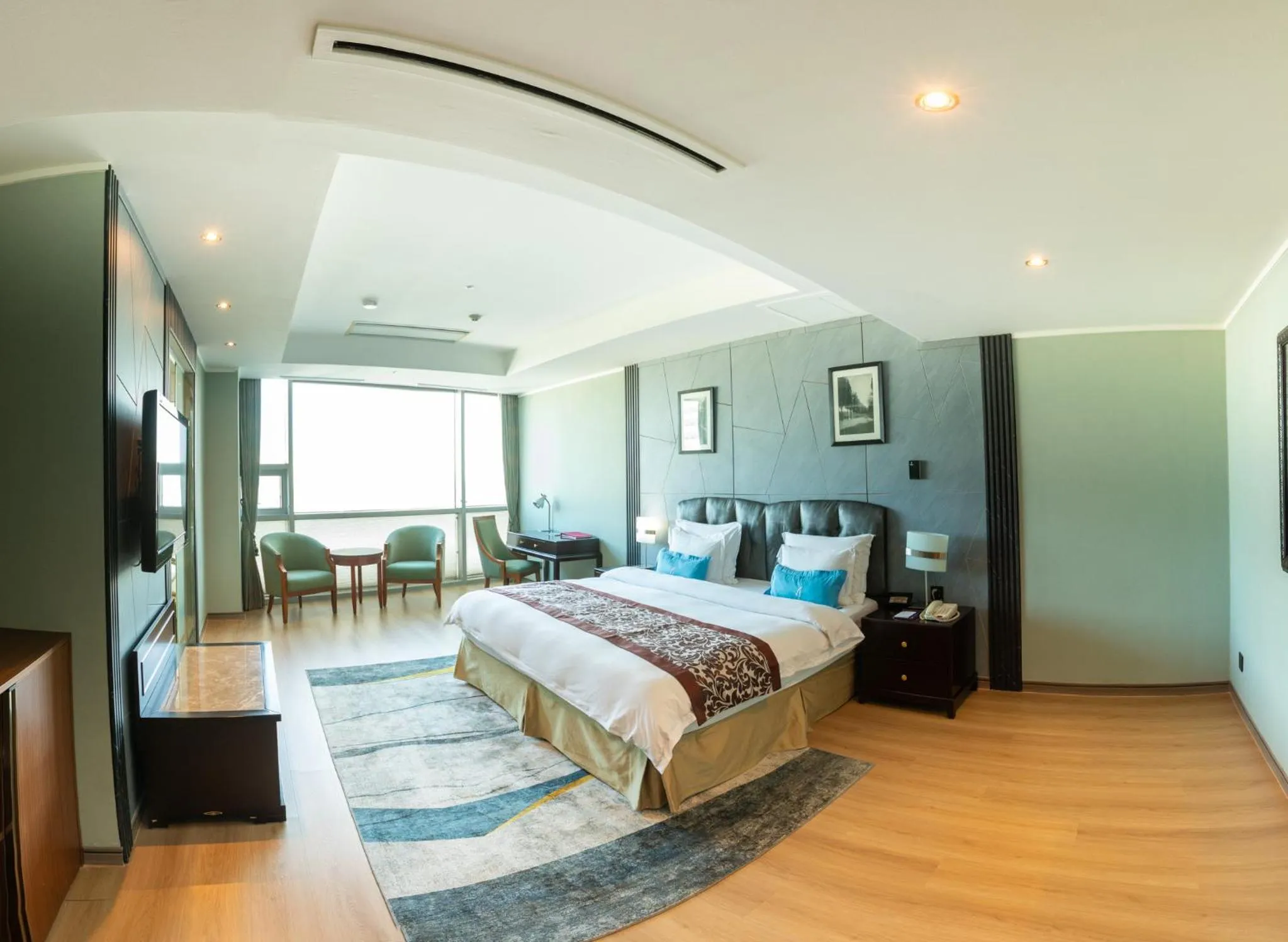 Bed in The Blue Sky Hotel and Tower