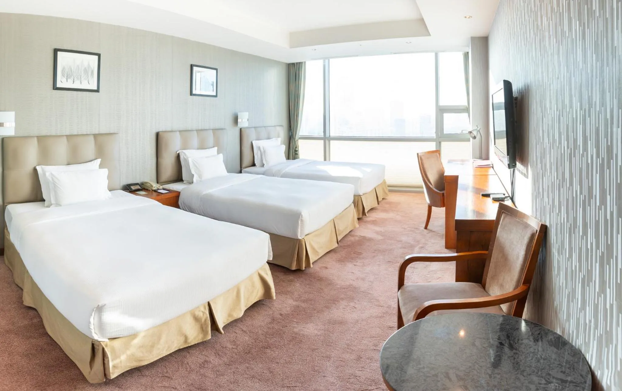 Bed in The Blue Sky Hotel and Tower