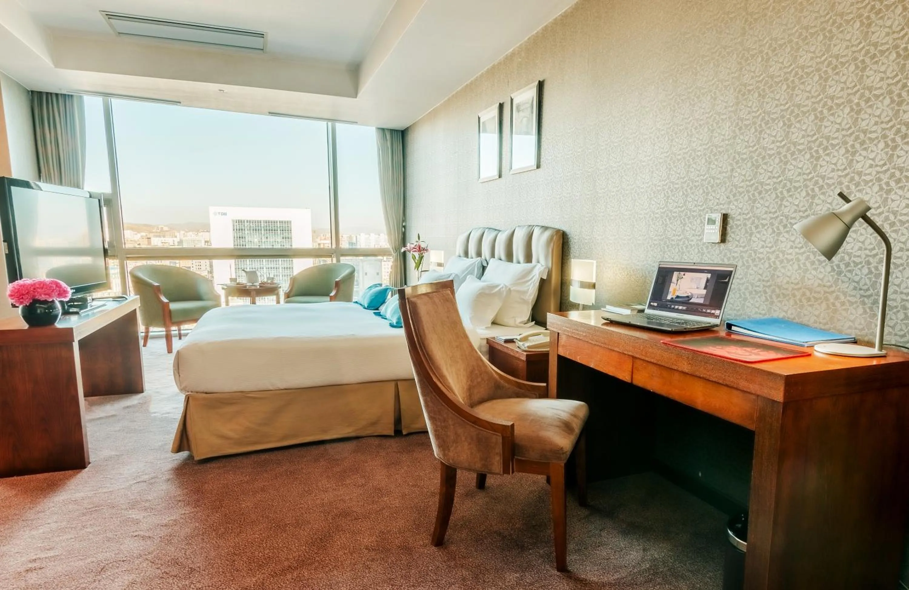 Bed in The Blue Sky Hotel and Tower