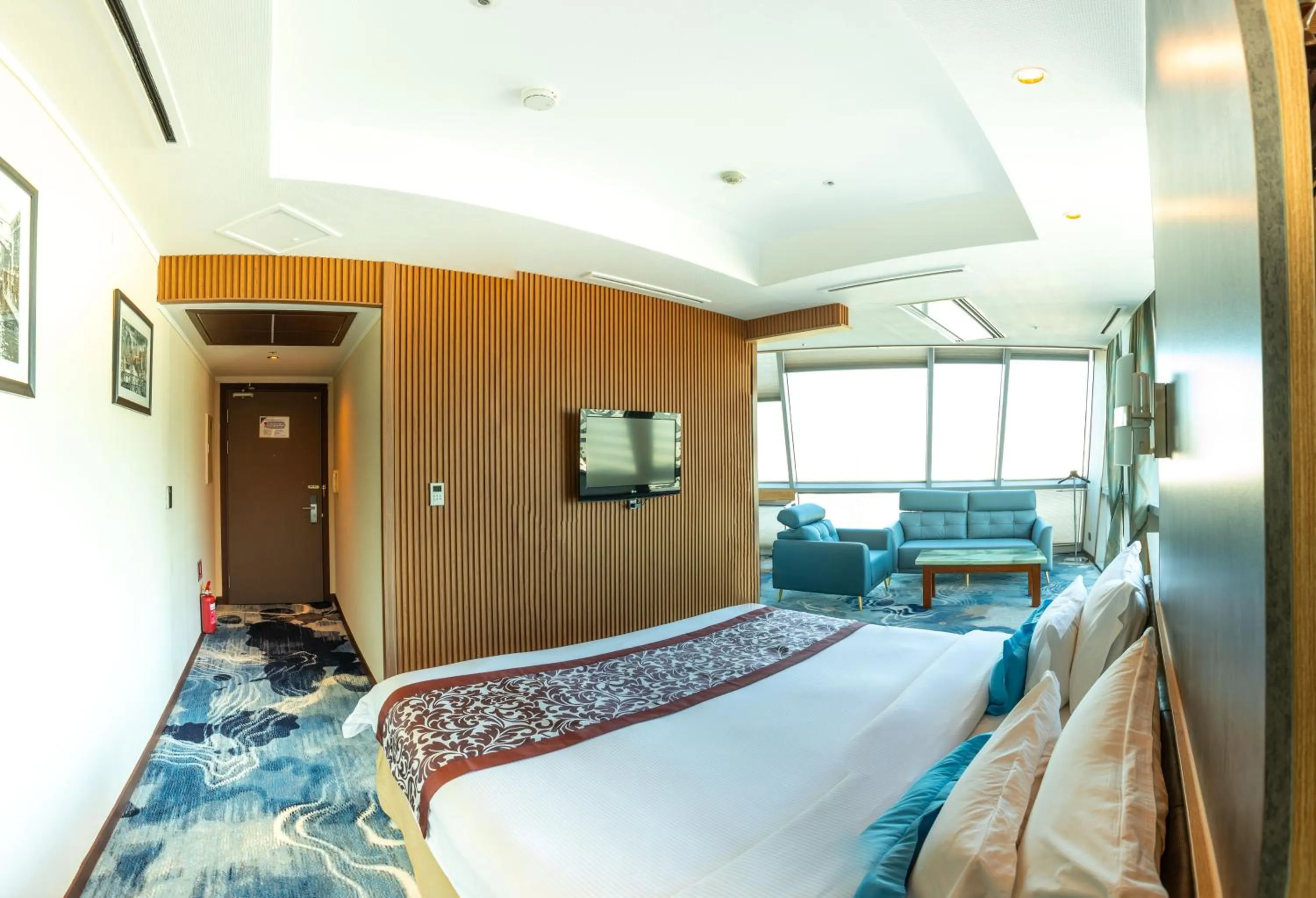 Bed in The Blue Sky Hotel and Tower