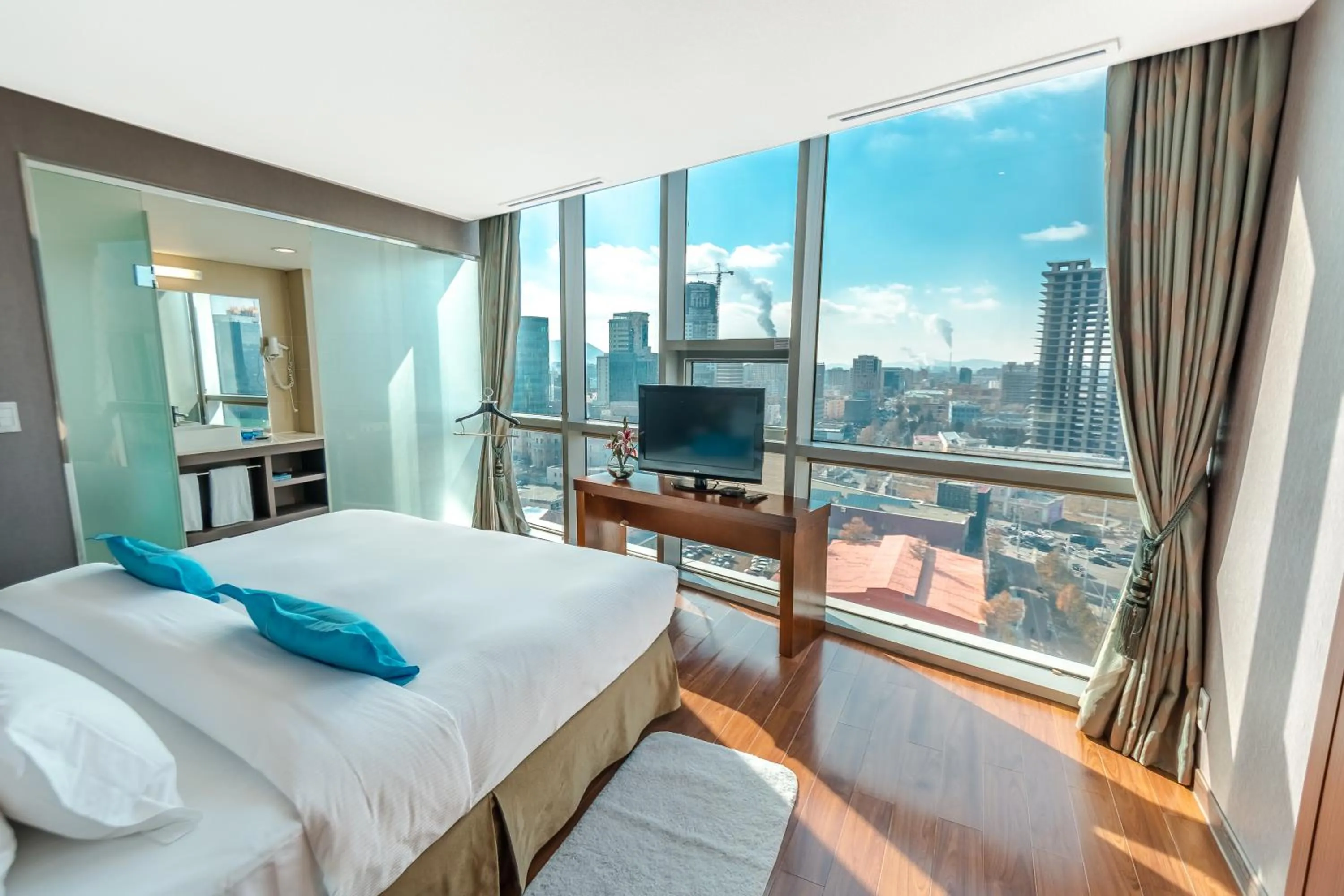 Bed in The Blue Sky Hotel and Tower