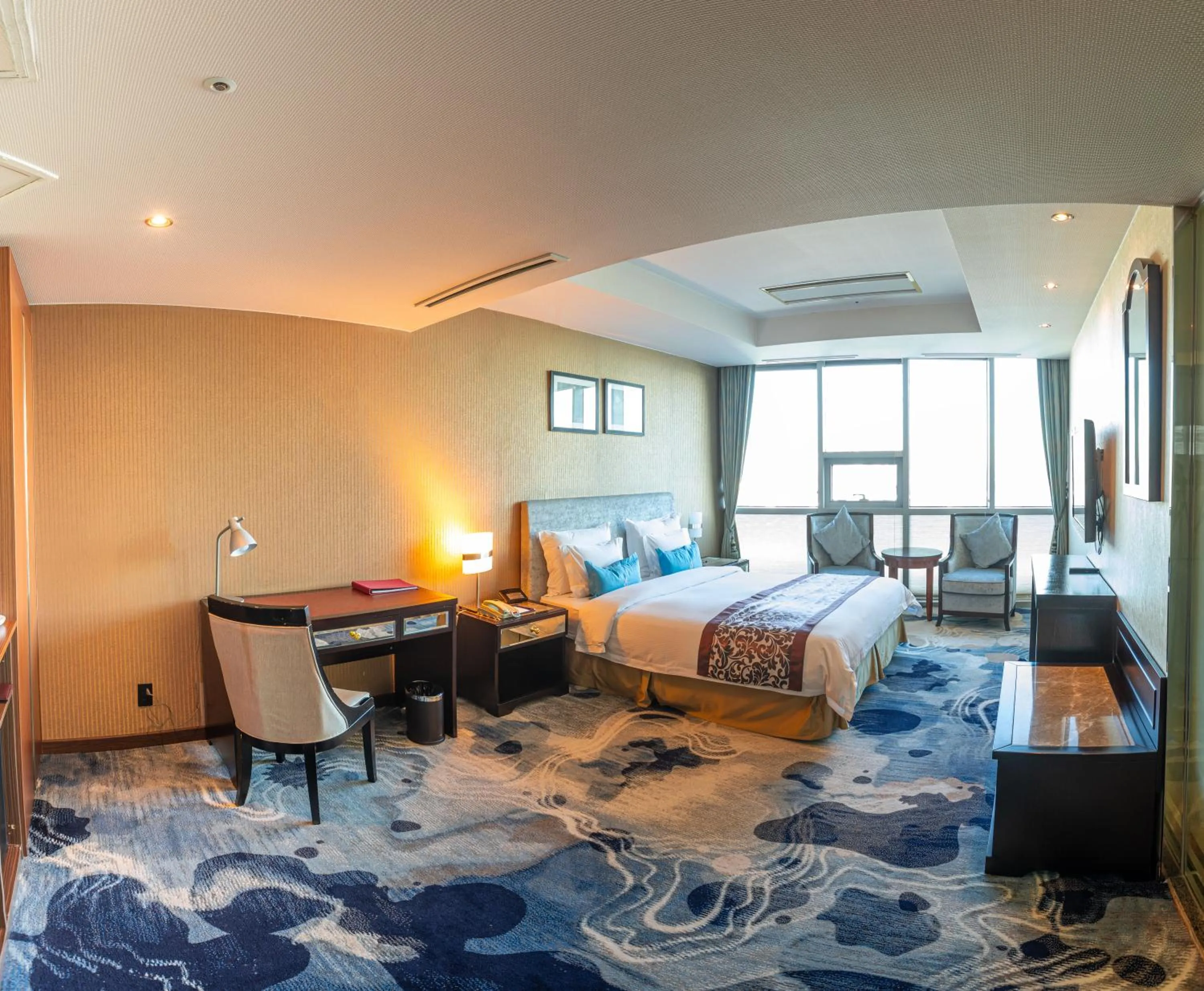 Bed in The Blue Sky Hotel and Tower