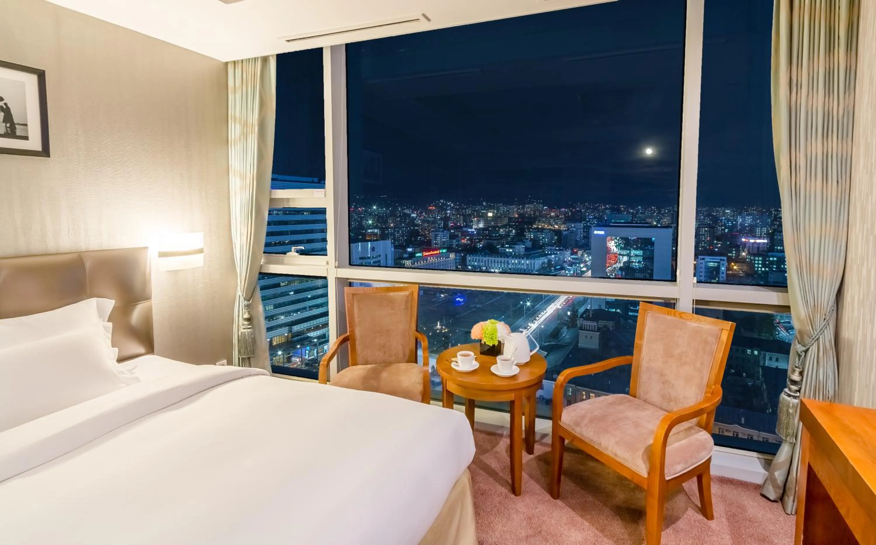 Bed in The Blue Sky Hotel and Tower