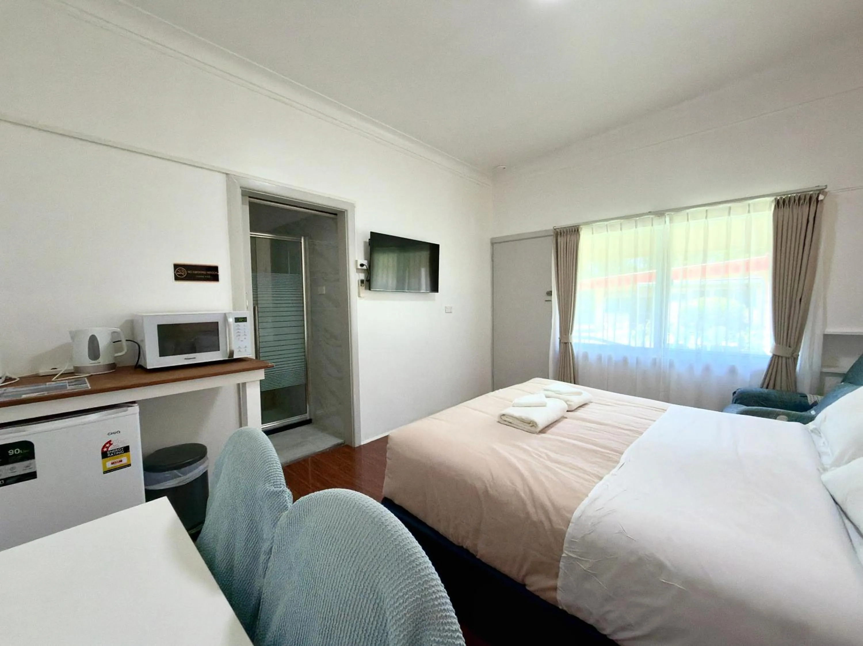 Bed in Major Innes Motel