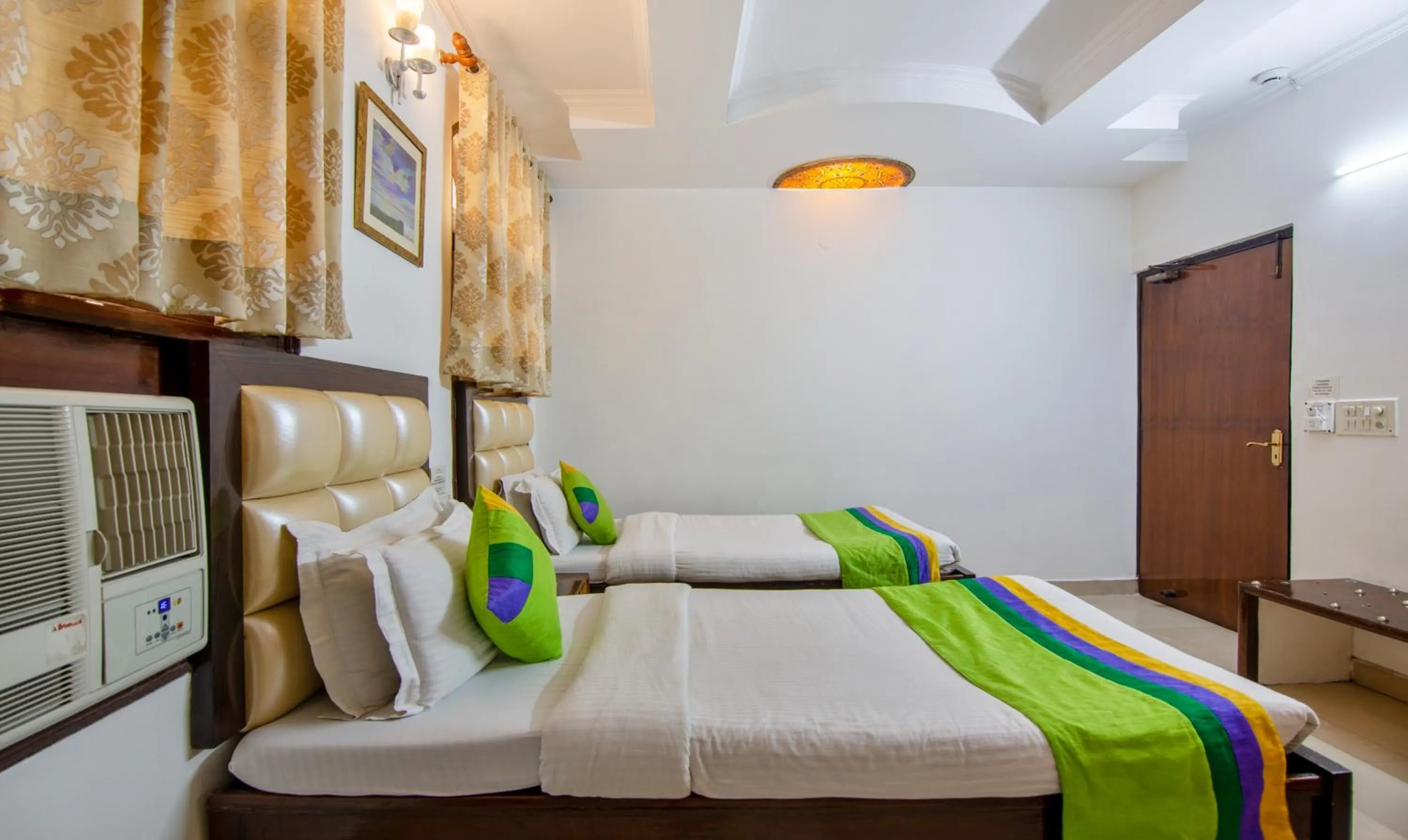 Bedroom, Bed in Treebo Paras International