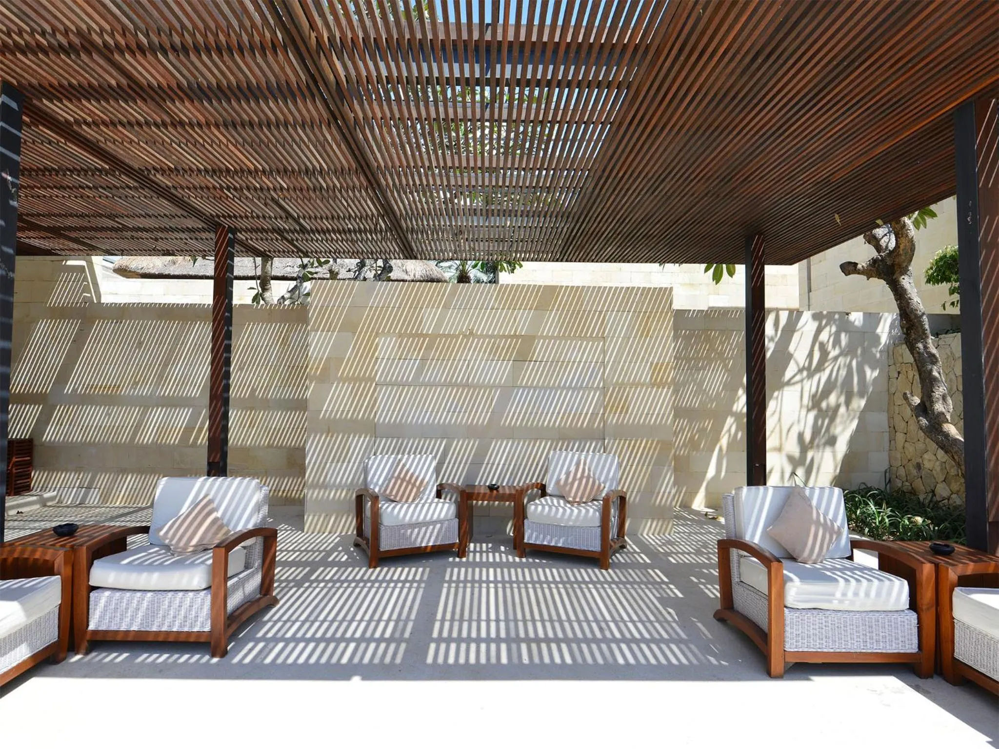 Communal lounge/ TV room in The Bale Nusa Dua by LifestyleRetreats