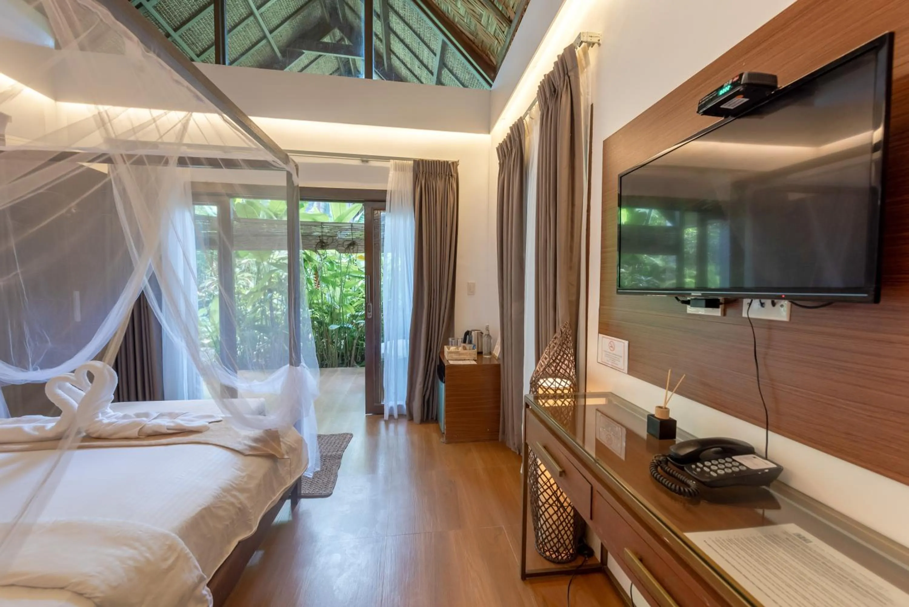 Photo of the whole room, Bed in The Hillside Resort Siargao