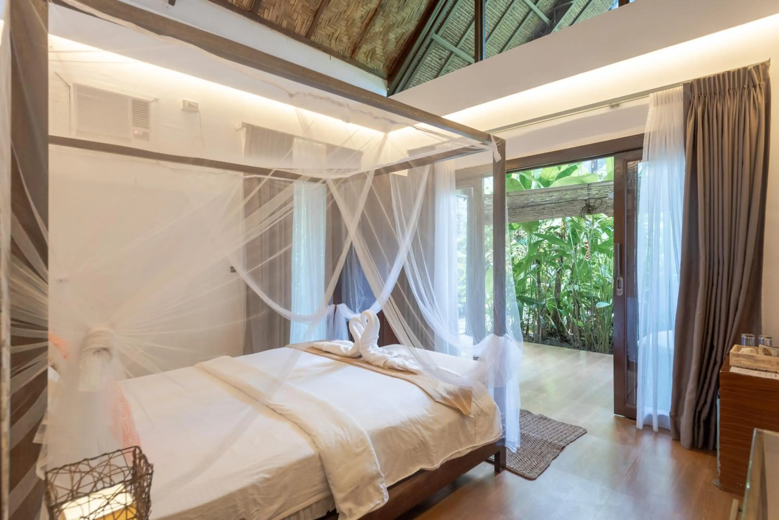 Photo of the whole room, Bed in The Hillside Resort Siargao