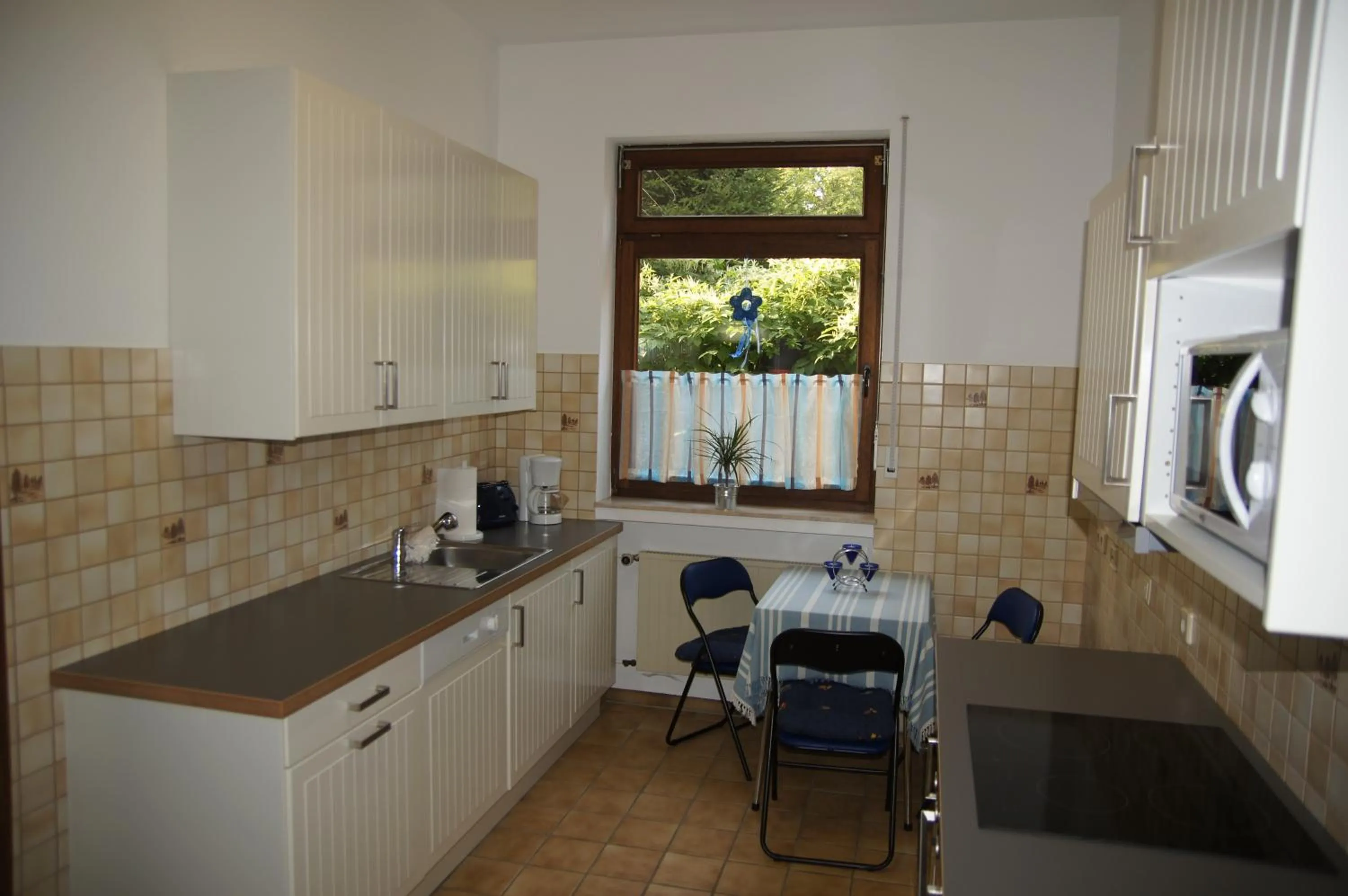 Communal kitchen in Gasthof Schumacher Hotel garni