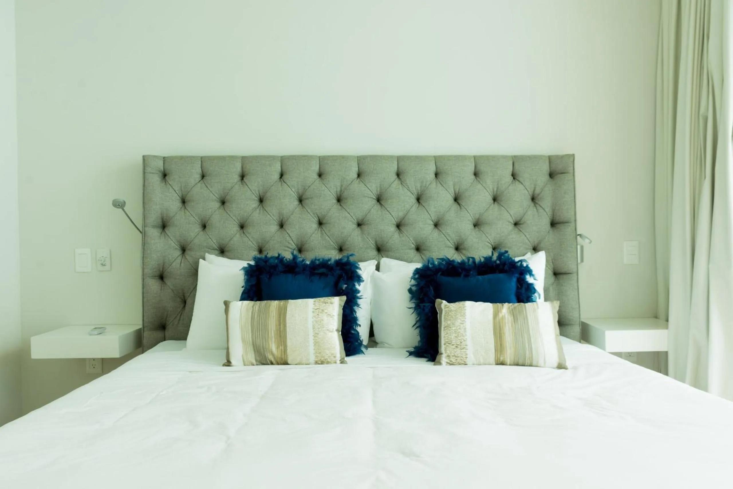 Bed in Tropic Playa Apartments