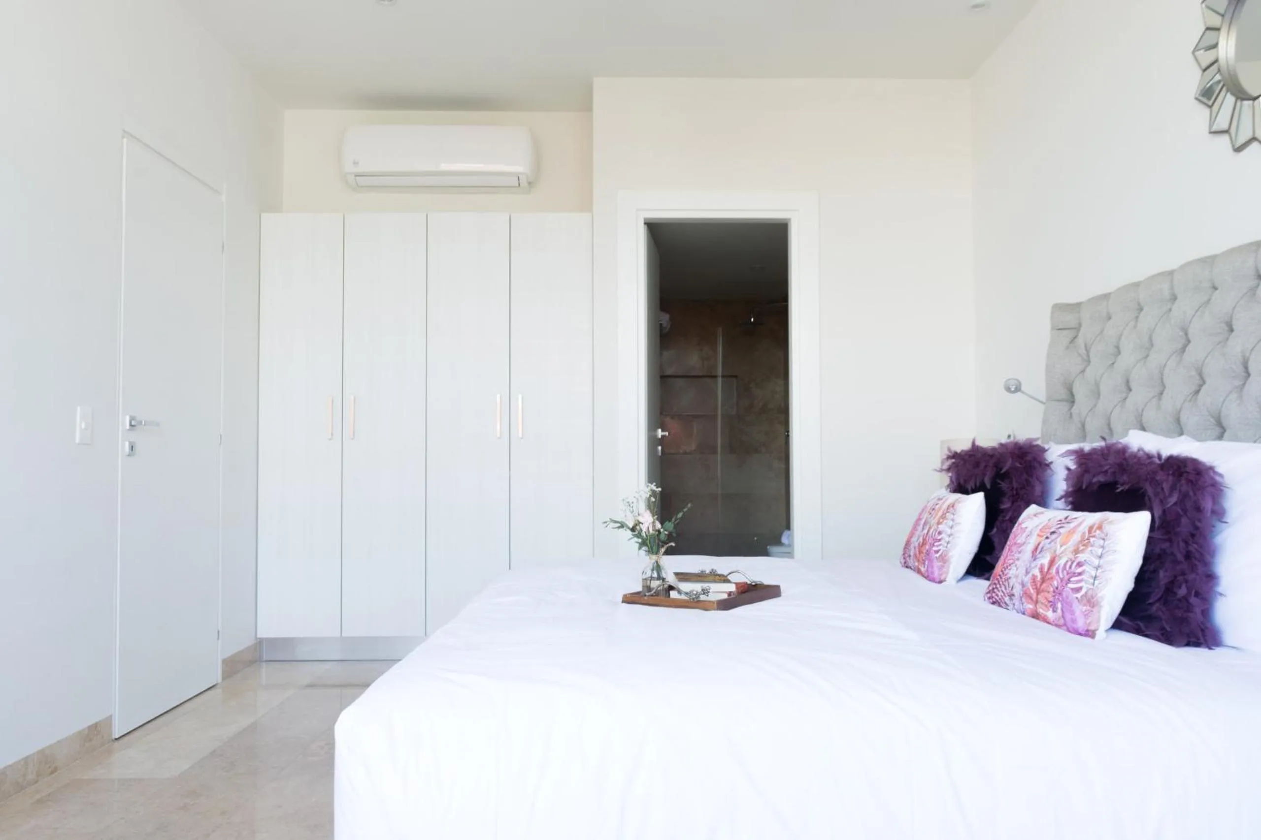 Bed in Tropic Playa Apartments