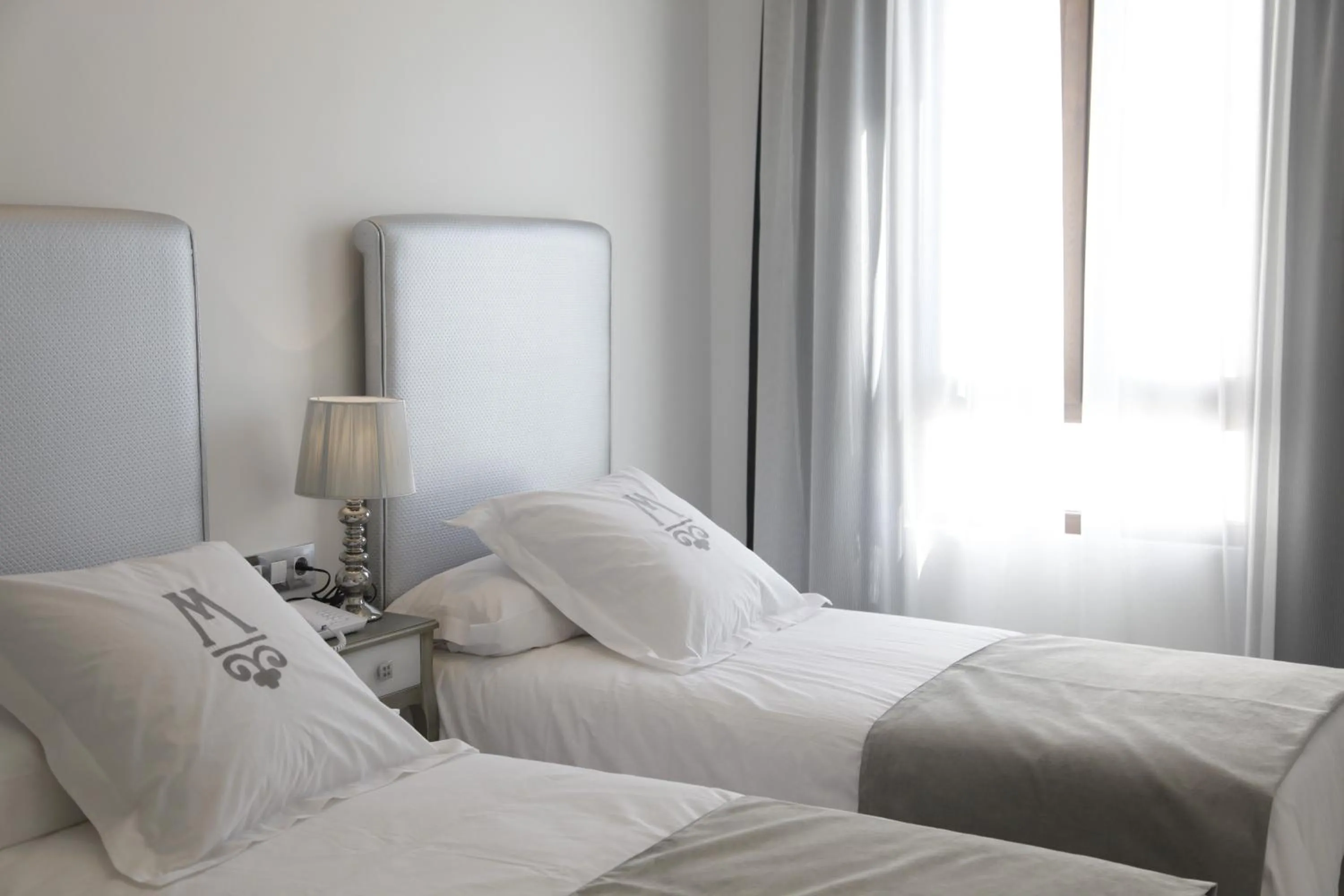 Bed in La Casa del Médico Hotel Boutique