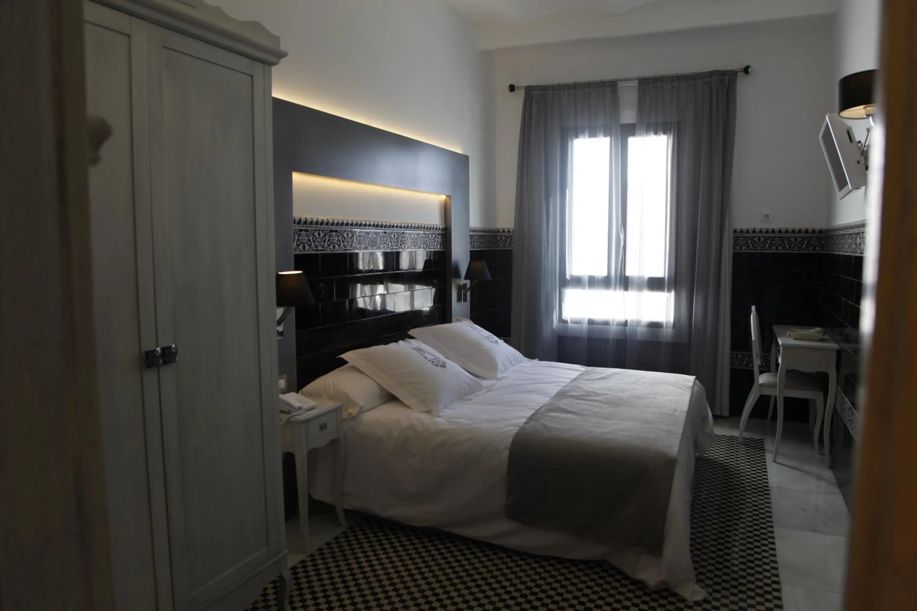 Bed in La Casa del Médico Hotel Boutique