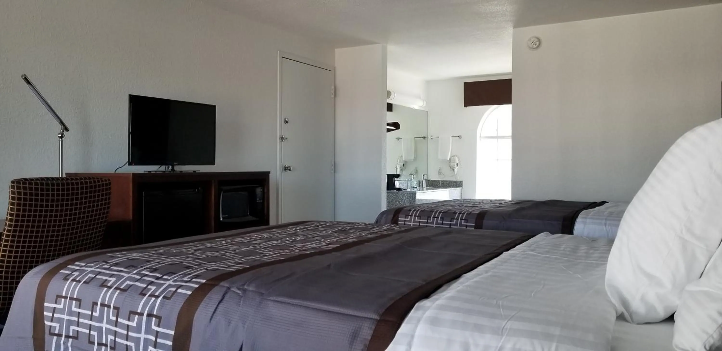 Bed in Key West Inn - Boaz