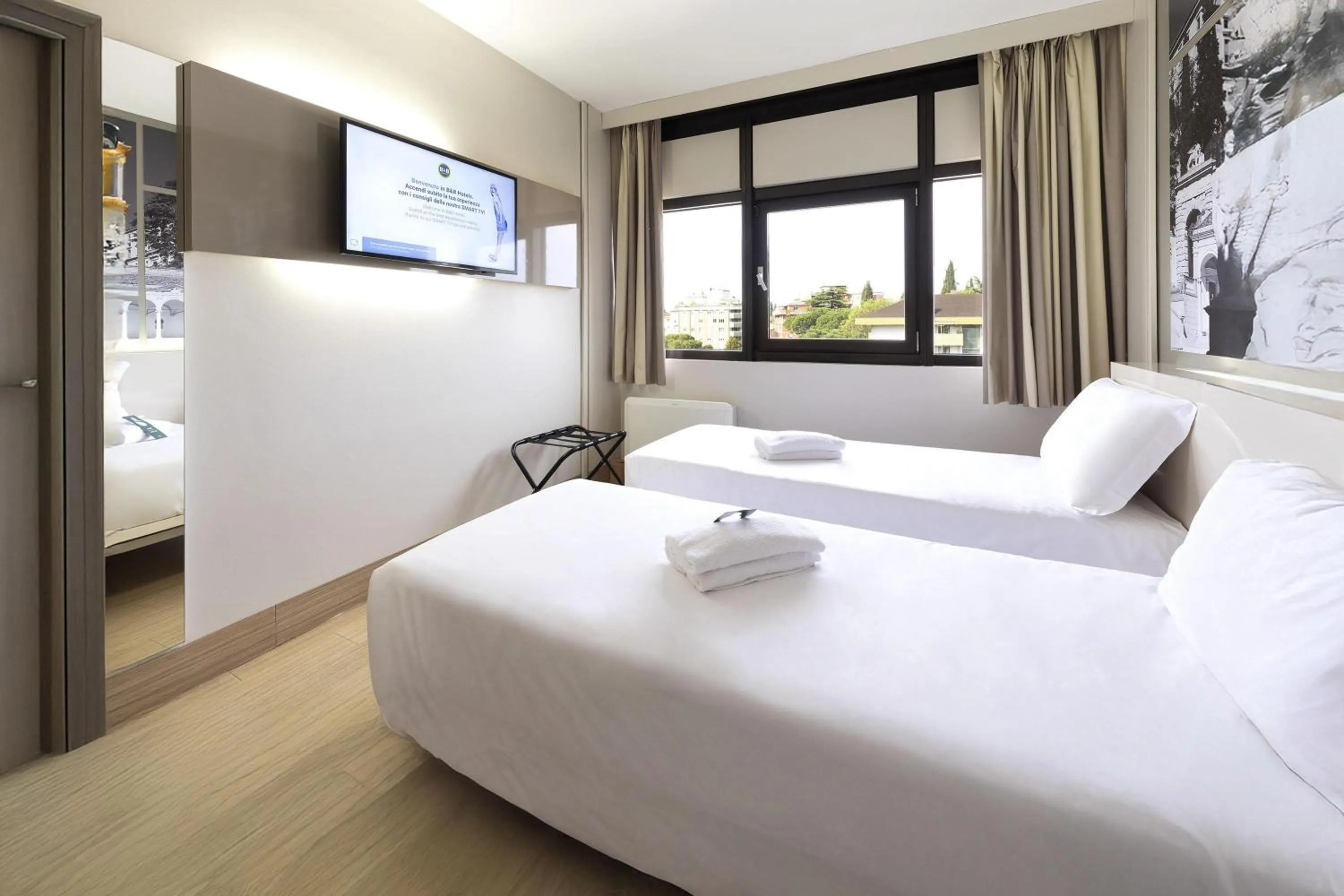 Photo of the whole room, Bed in B&B Hotel Udine