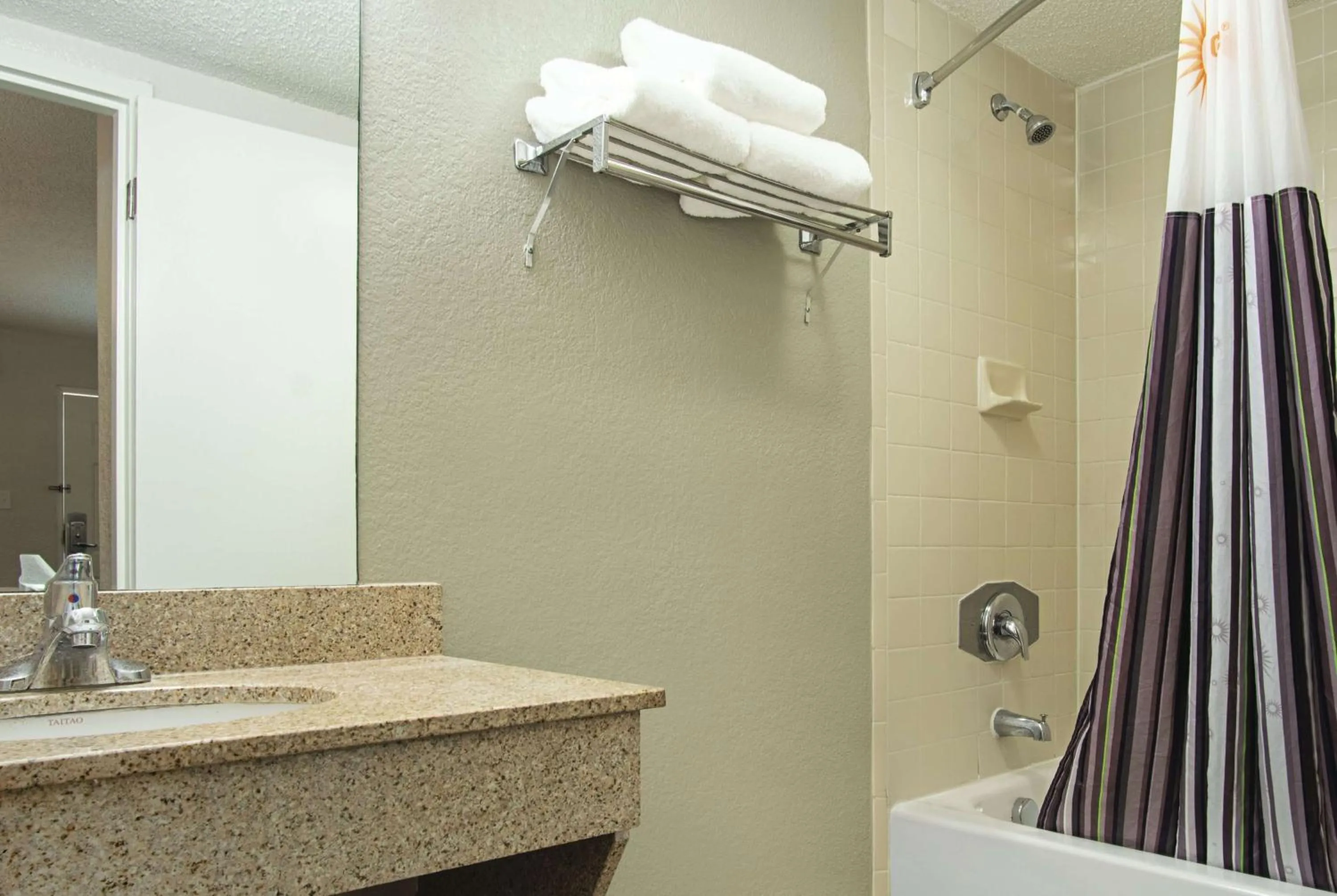 Photo of the whole room in La Quinta Inn by Wyndham West Palm Beach - Florida Turnpike