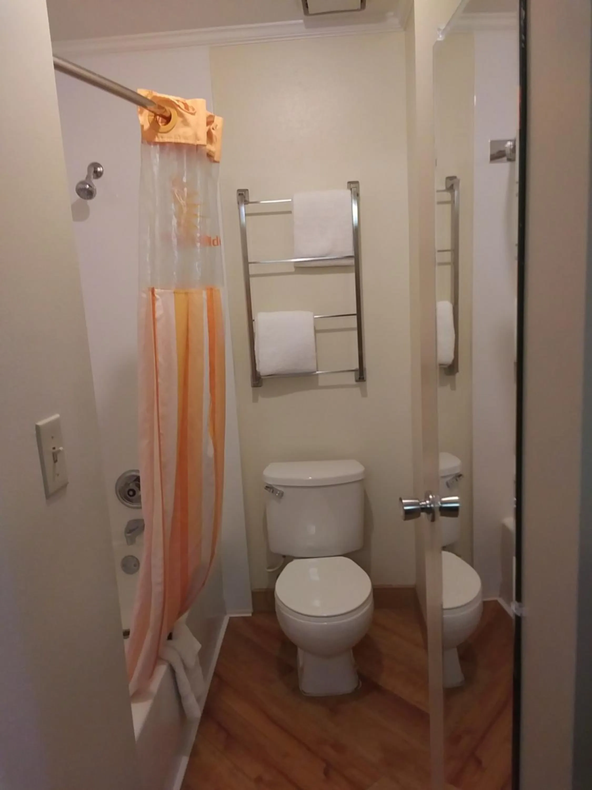 Bathroom in Travelodge by Wyndham Columbus State University