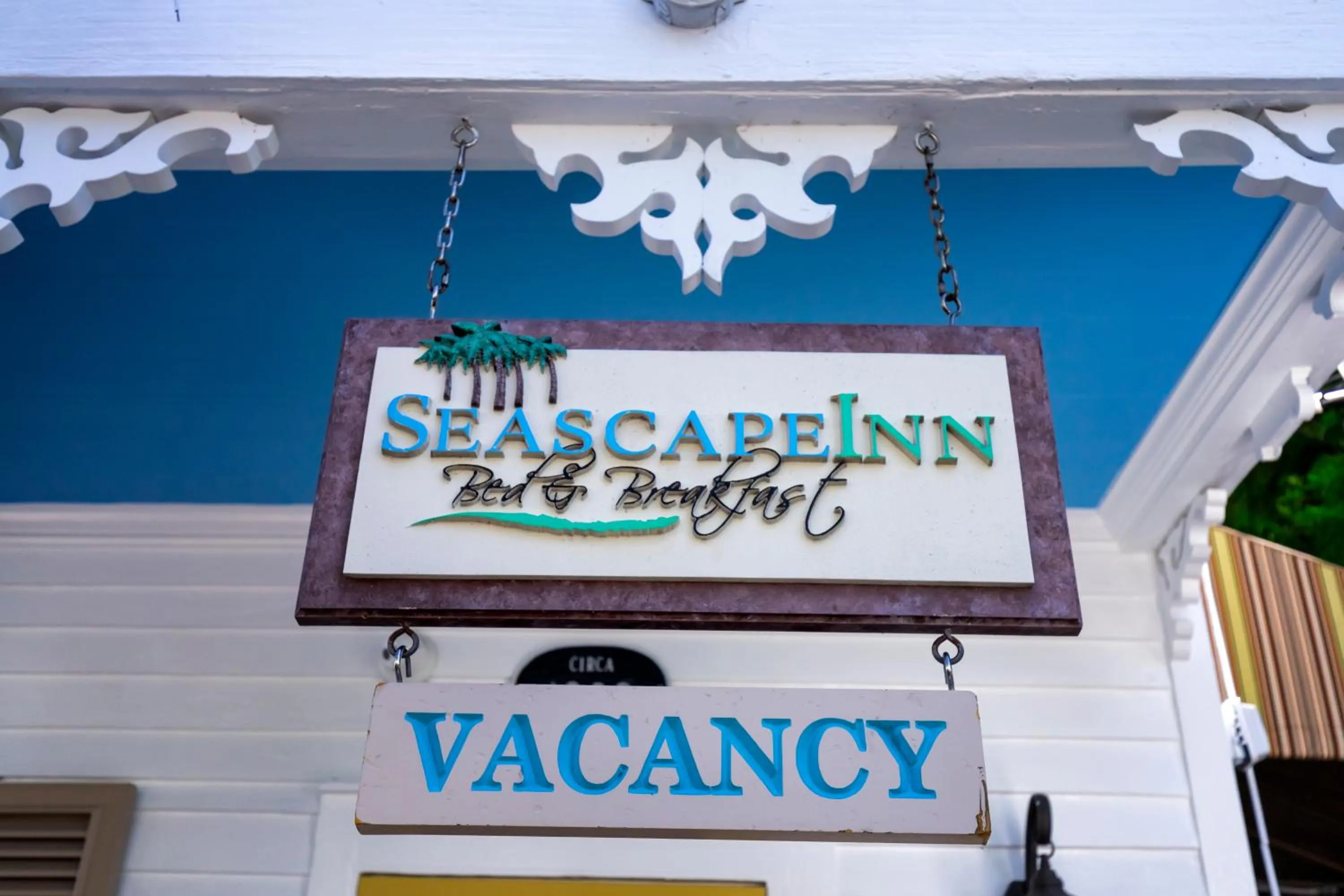 Property logo or sign in Seascape Tropical Inn