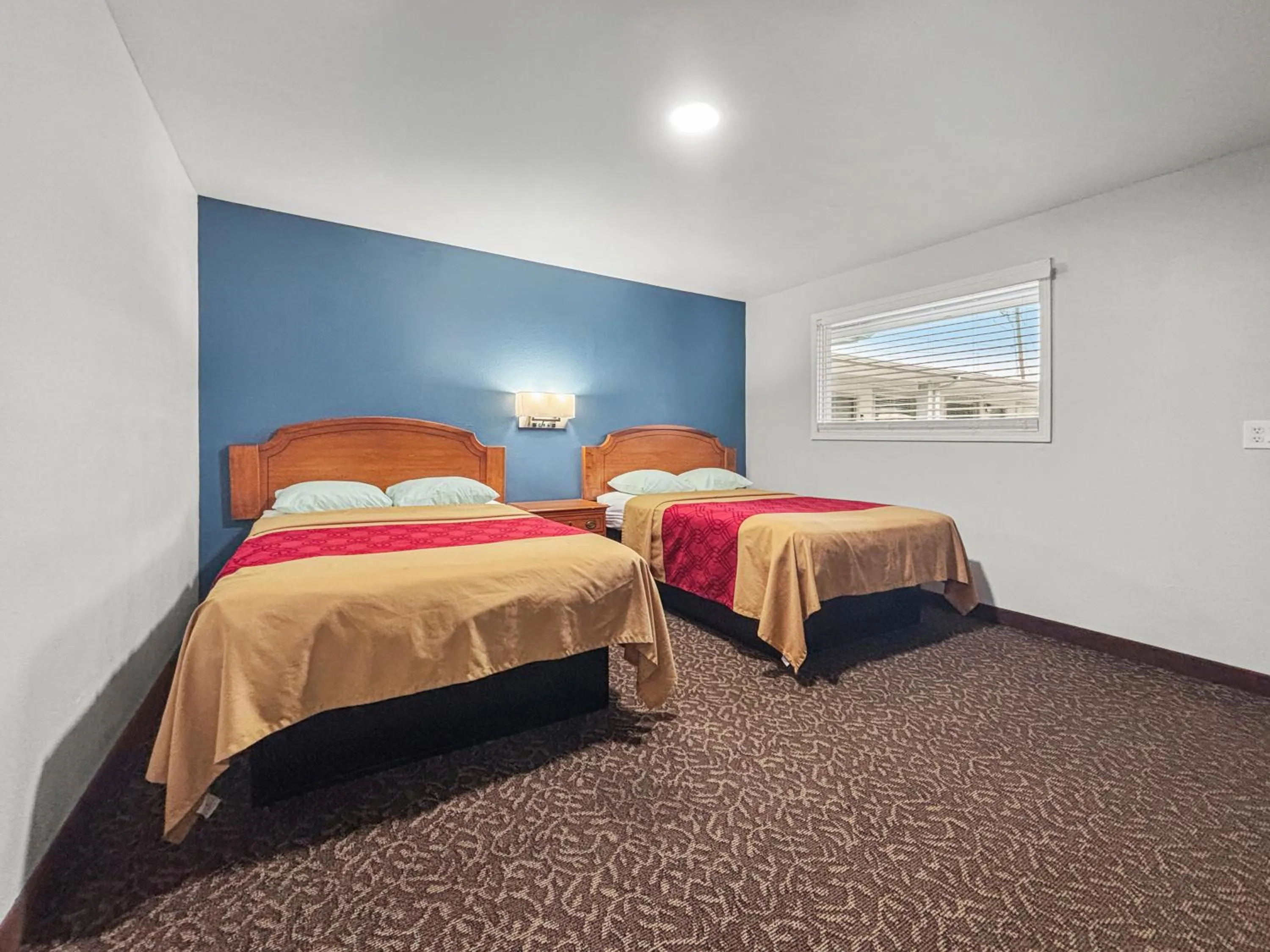 Bed in Budget Inn Madill