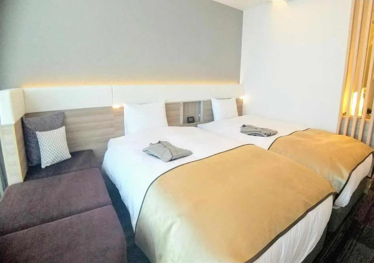 Bed in Urban Hotel Kyoto Gojo Premium