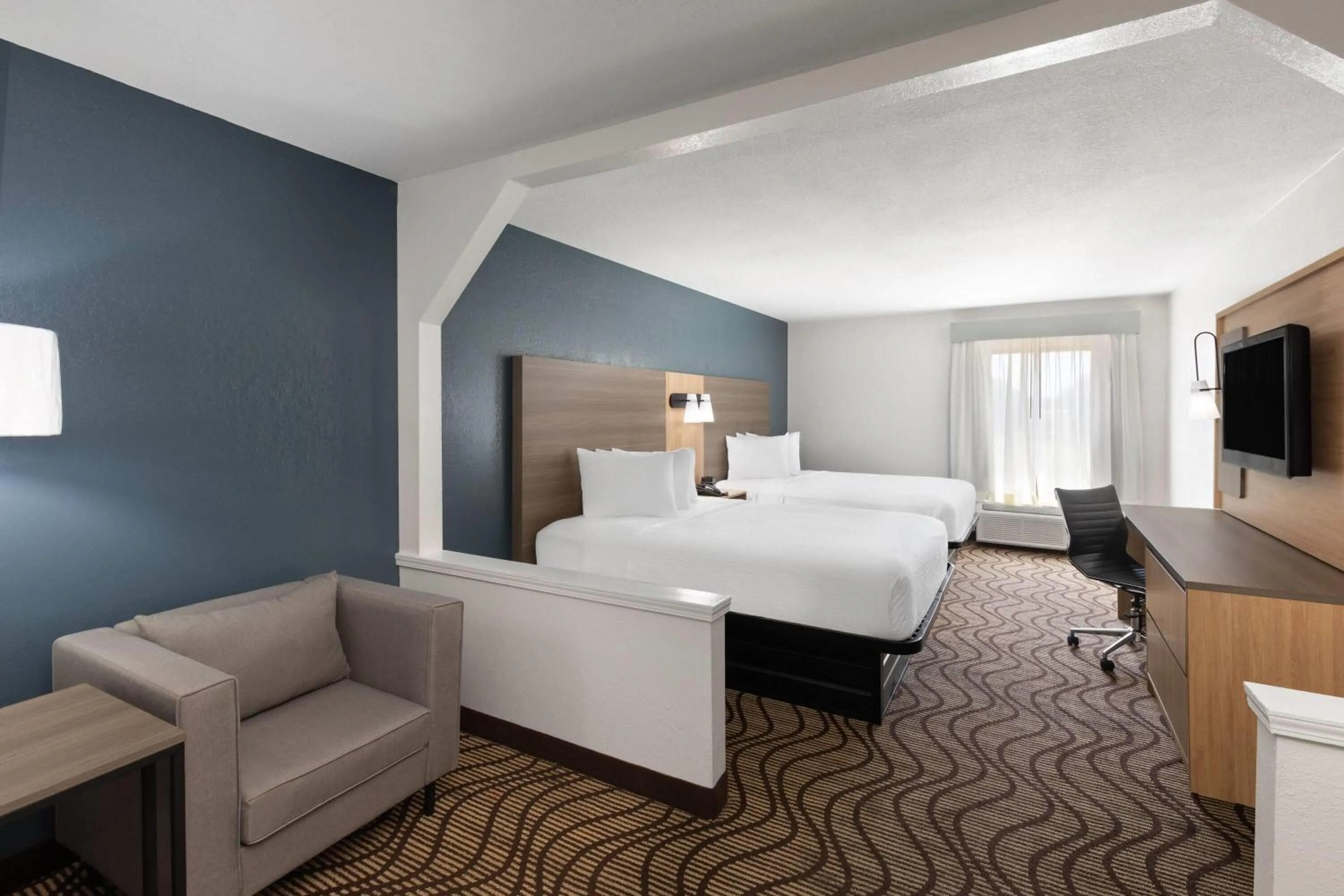 Photo of the whole room, Bed in Baymont by Wyndham Moss Point Pascagoula