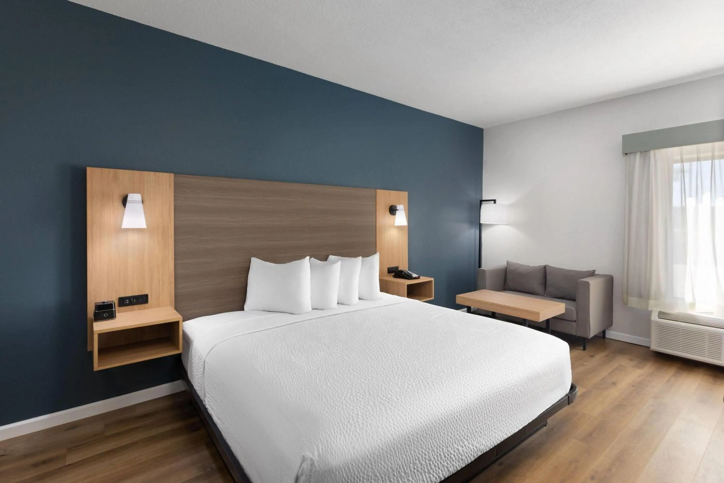 Photo of the whole room, Bed in Baymont by Wyndham Moss Point Pascagoula