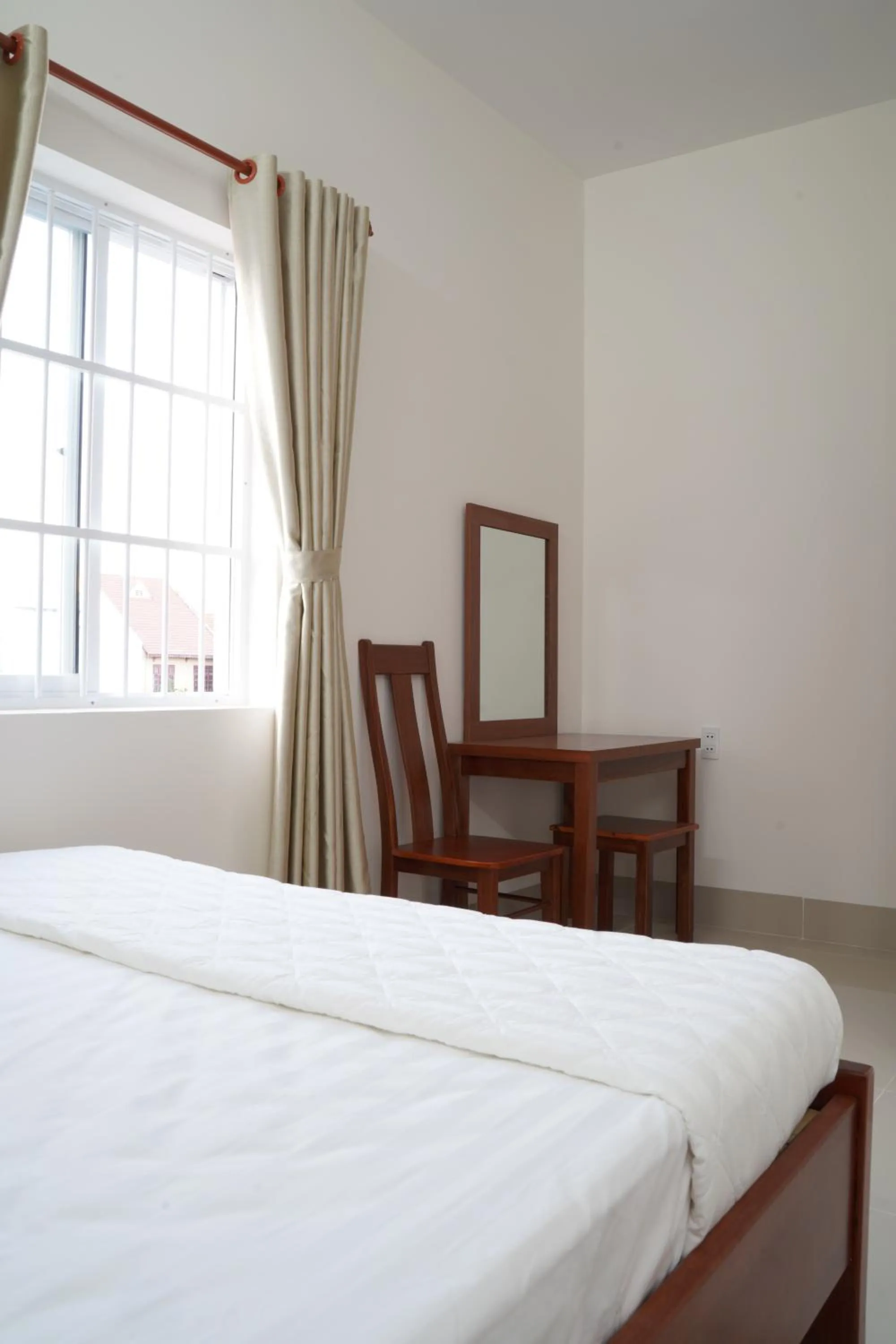 Bed in Jupiter Hotel