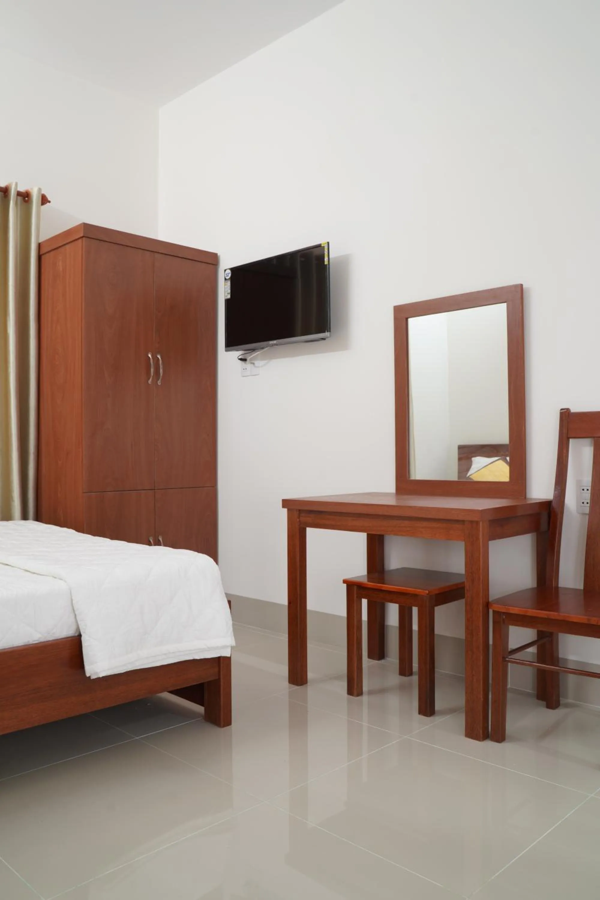 Bed in Jupiter Hotel