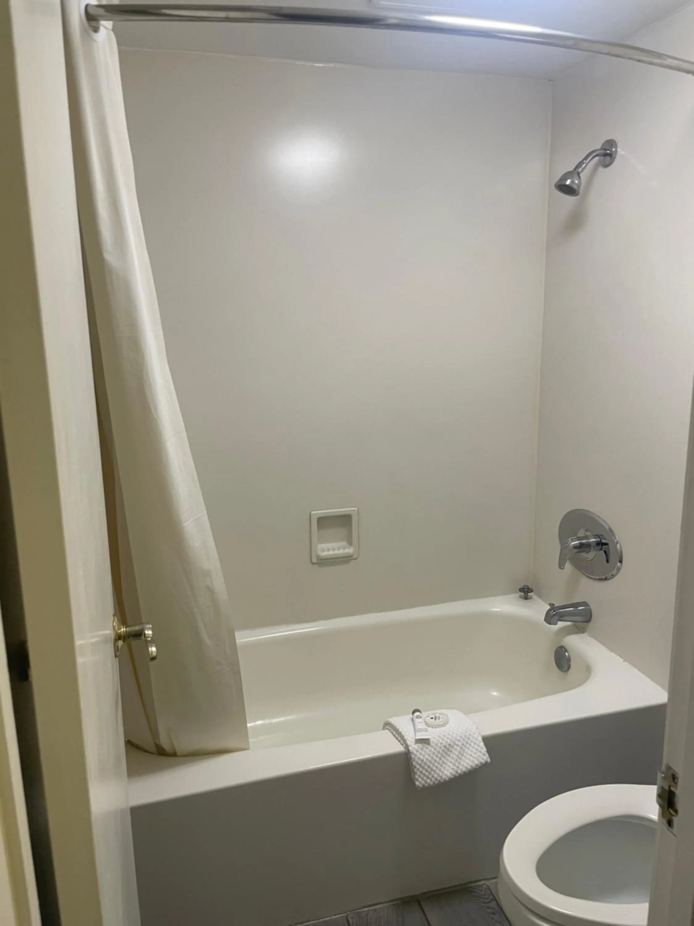 Bathroom in Travelodge by Wyndham Tuscaloosa