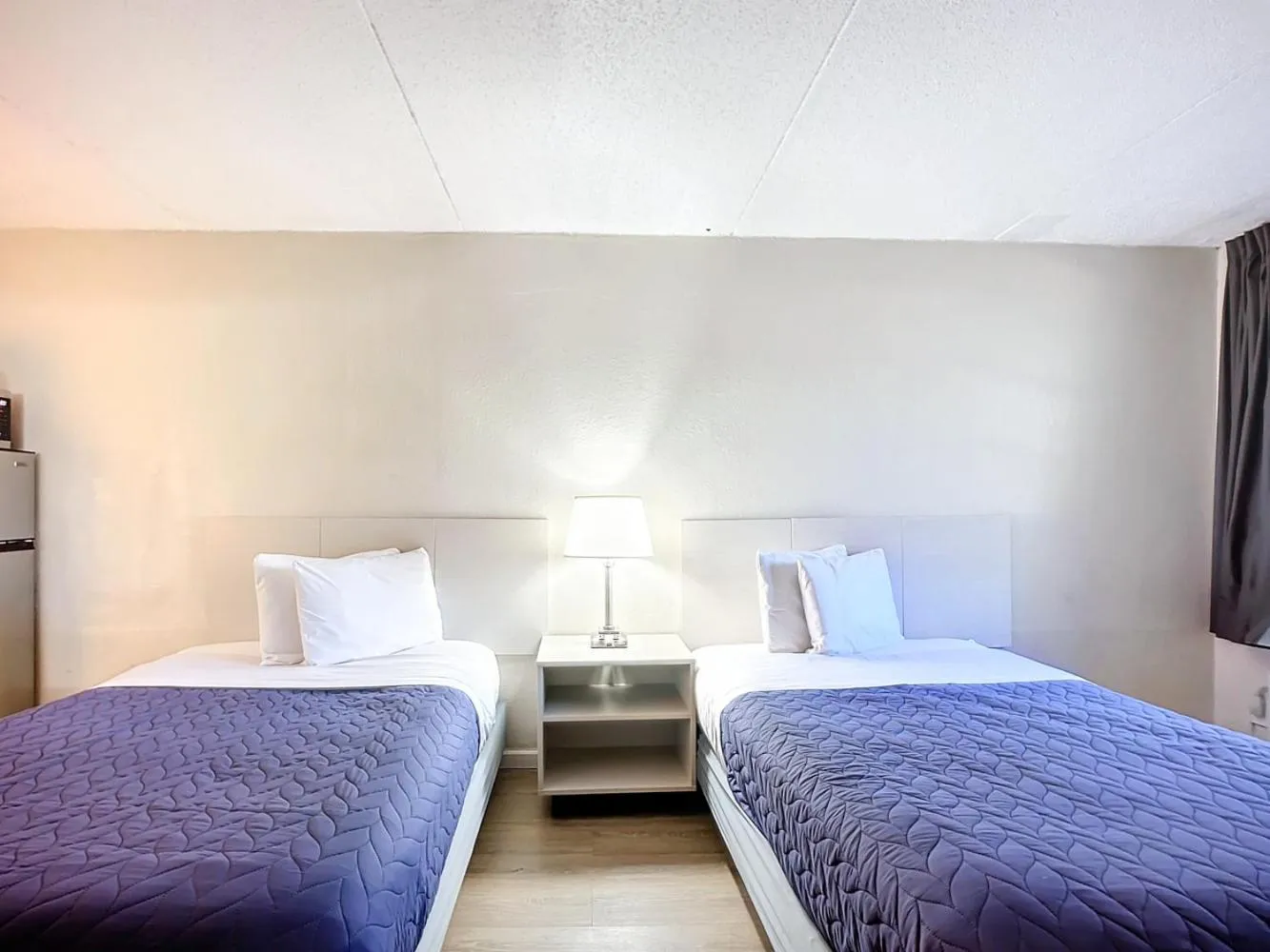 Bed in SoHo Inn and Suites Jacksonville North