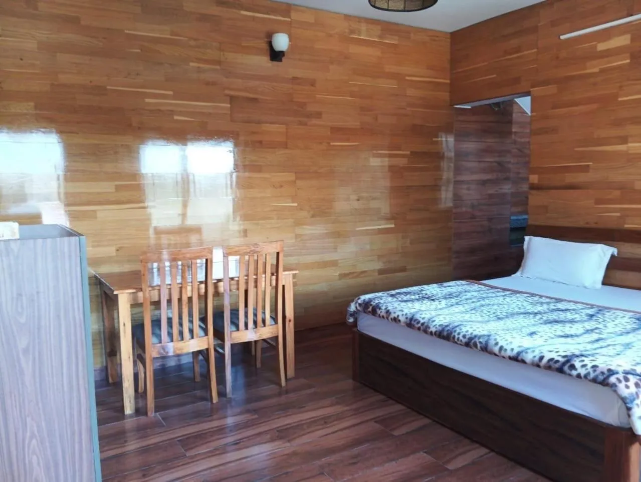 Dining area, Bed in Khushi Cottage