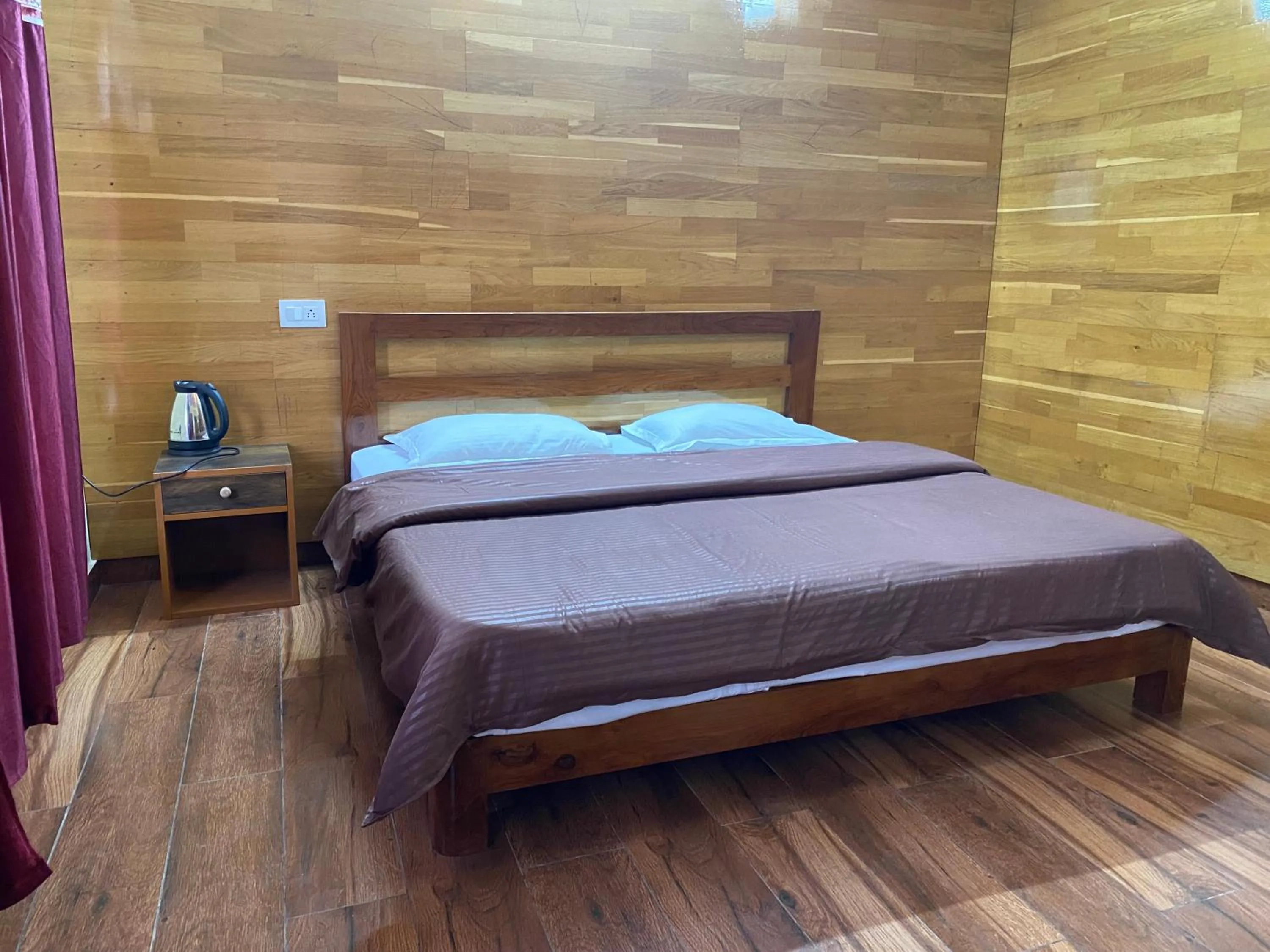 Bed in Khushi Cottage