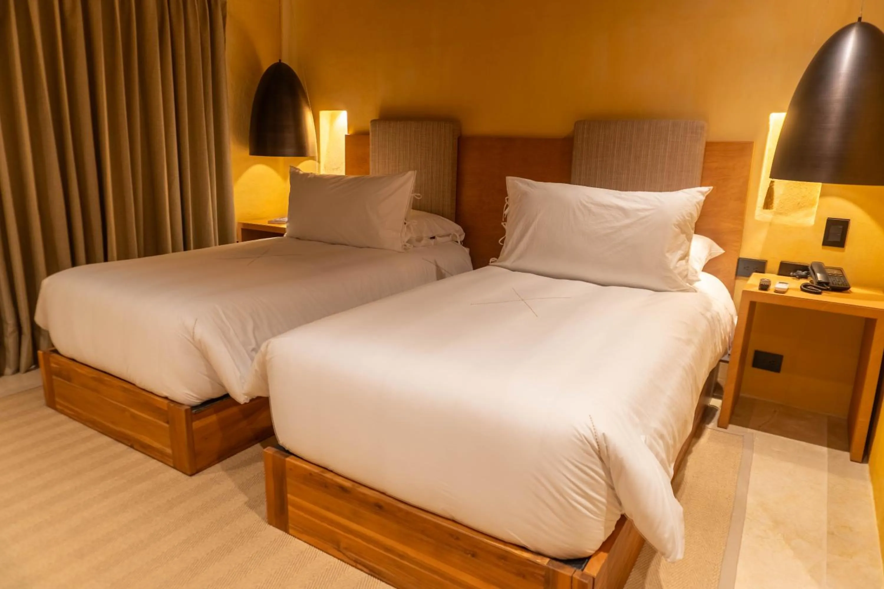 Bed in Casa Carolina Luxury Wellness Hotel