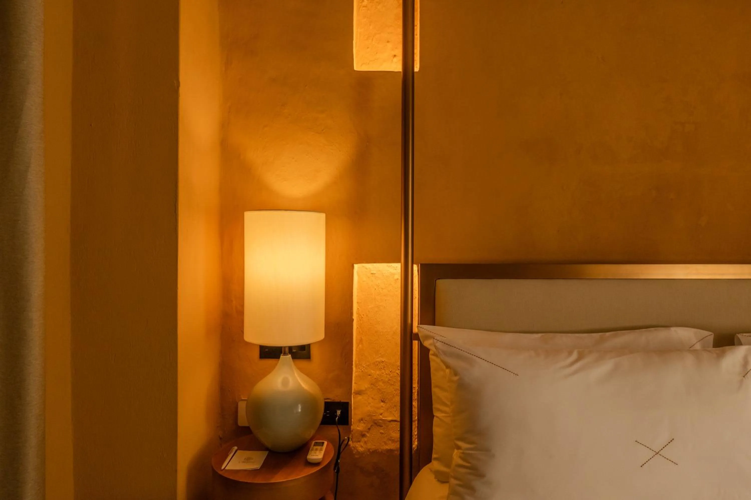 Bed in Casa Carolina Luxury Wellness Hotel