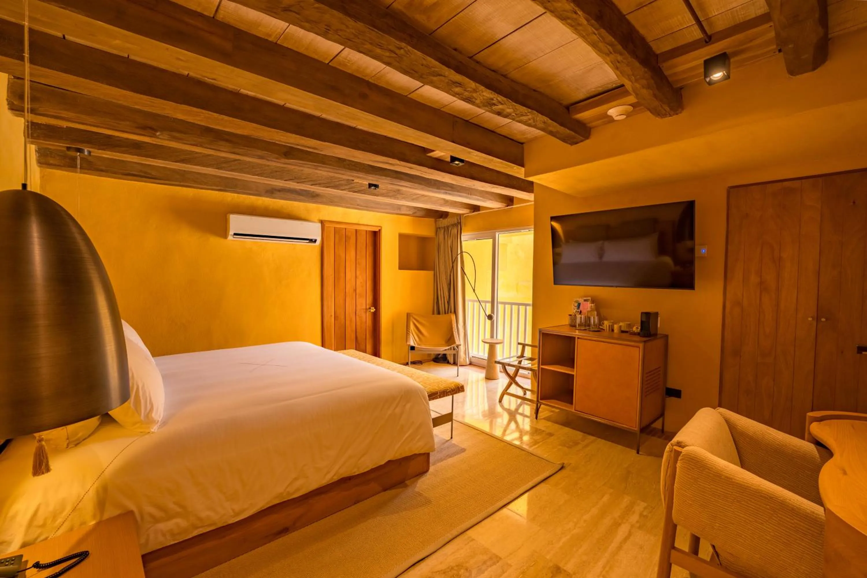 Bed in Casa Carolina Luxury Wellness Hotel