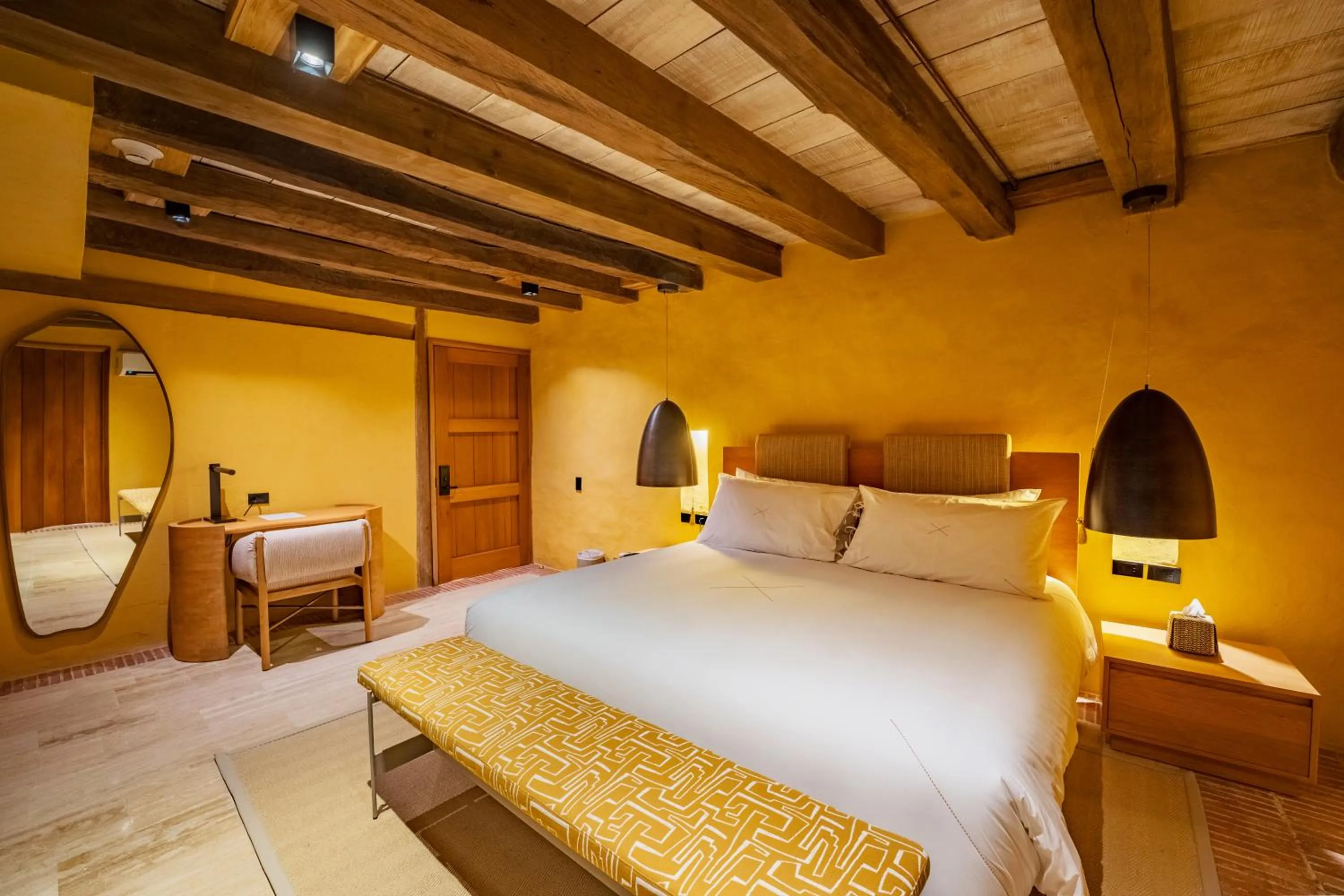 Bed in Casa Carolina Luxury Wellness Hotel