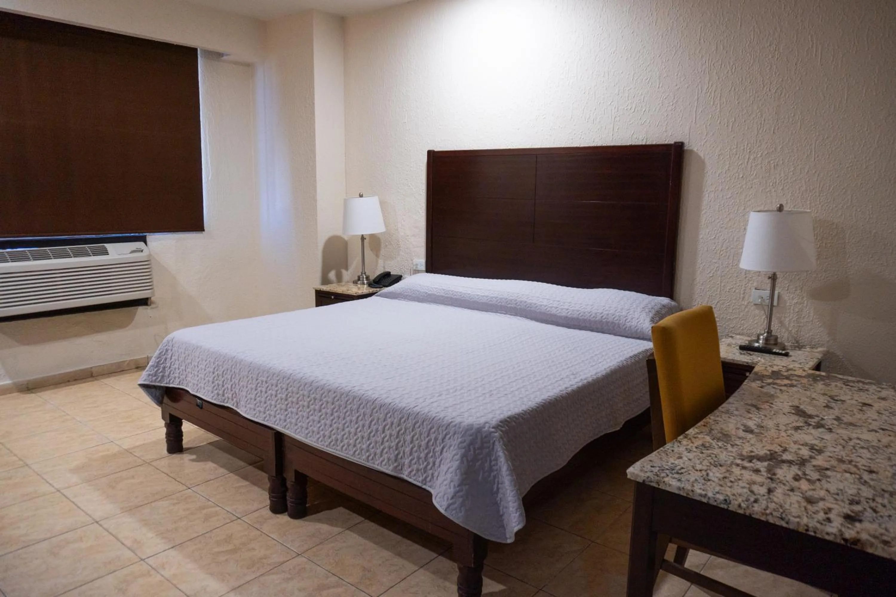 Bed in Hotel America Palacio