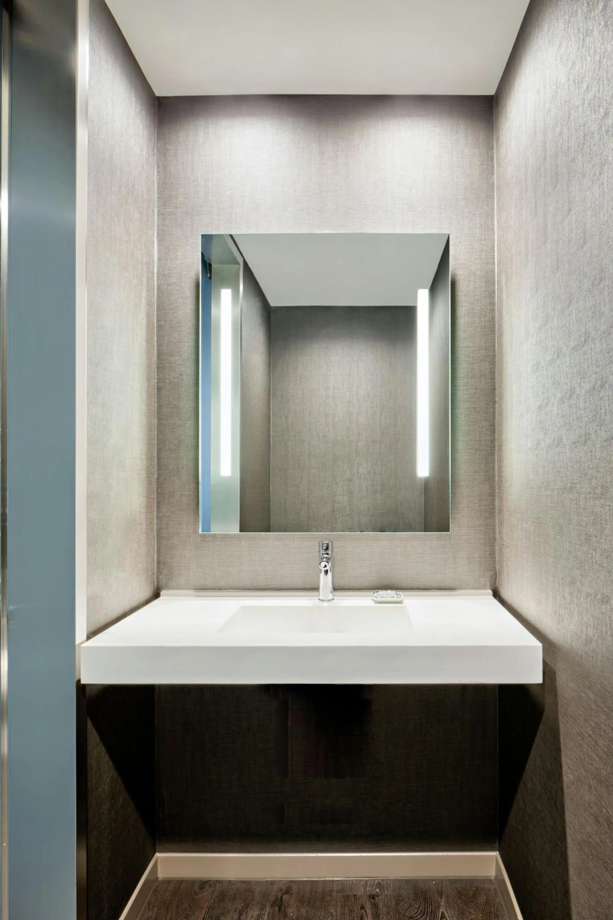 Bathroom in AC Hotel by Marriott Grand Rapids Downtown