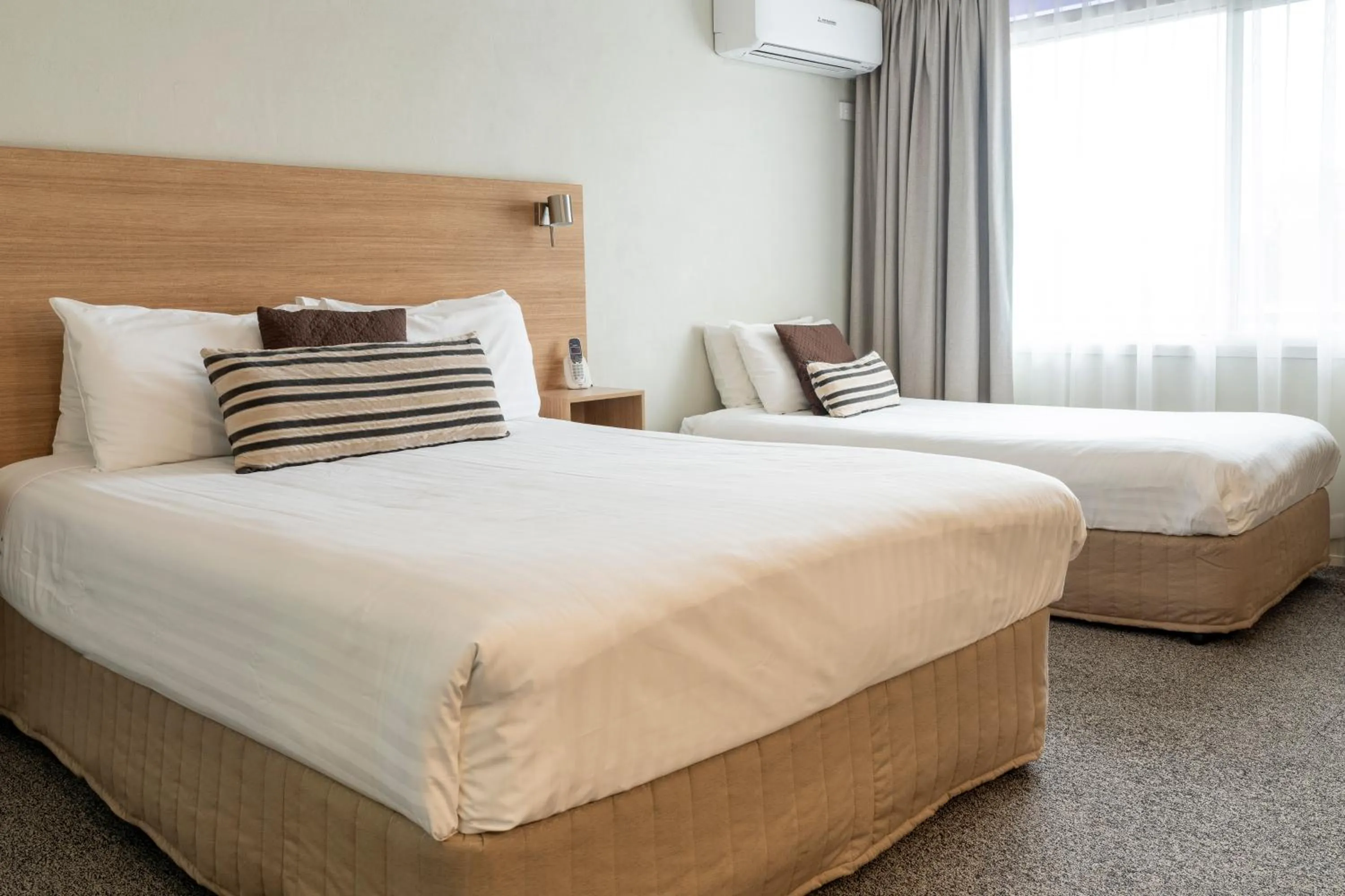 Bed in Posthouse Motor Lodge