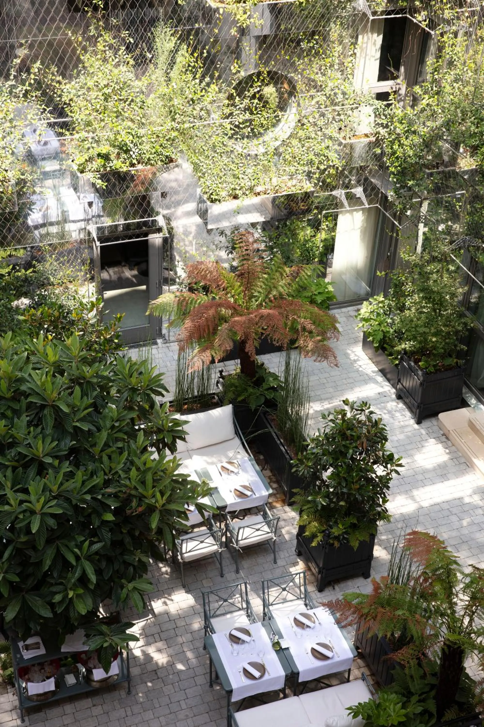 Patio in Les Jardins du Faubourg Hotel & Spa by Shiseido