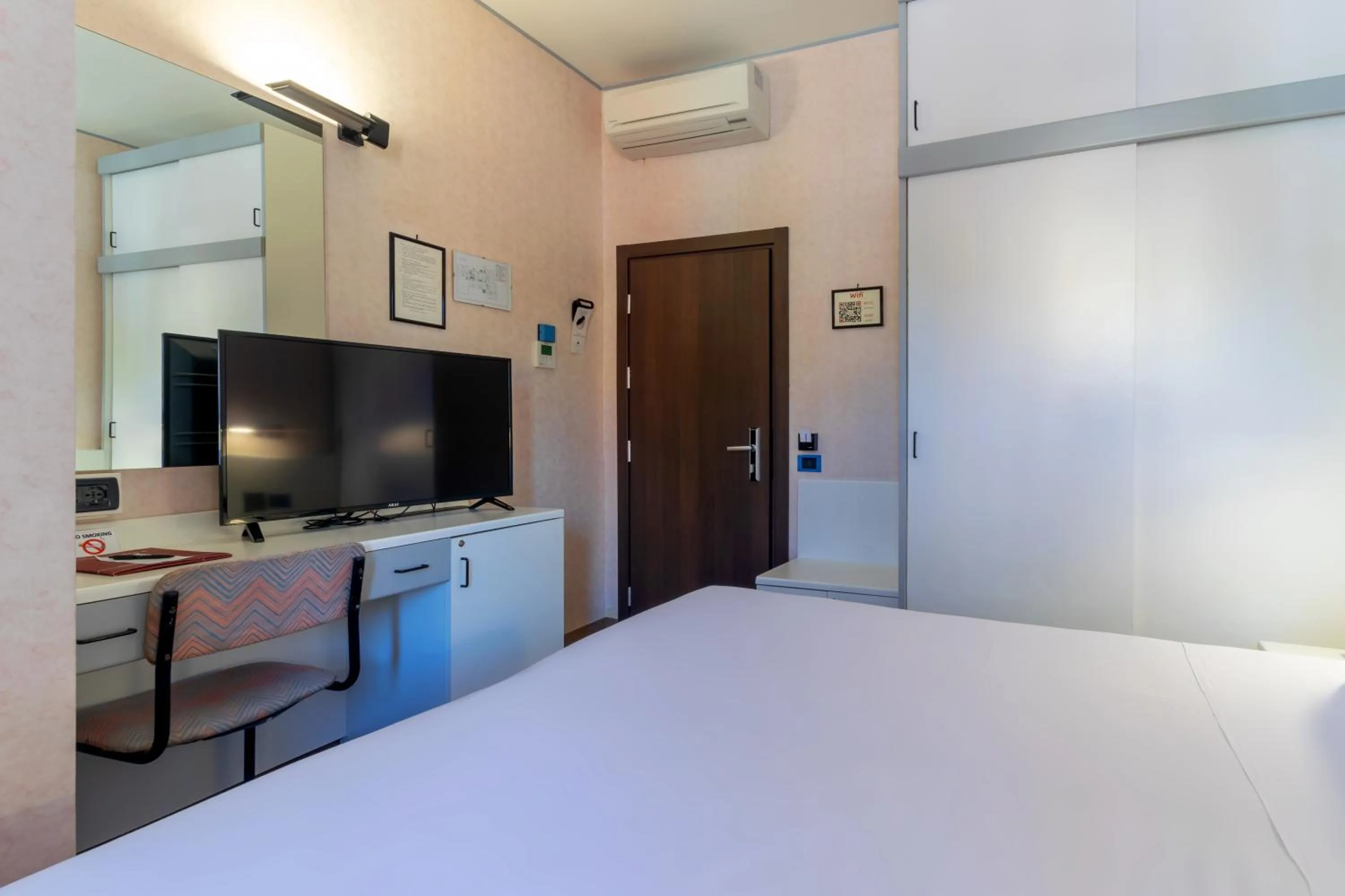 Bed in Hotel Falco D'Oro by Falco D'Oro Hotels